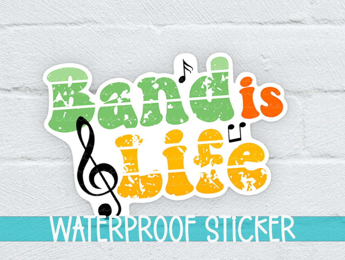 Band Is Life sticker on a white brick background with a waterproof sticker banner