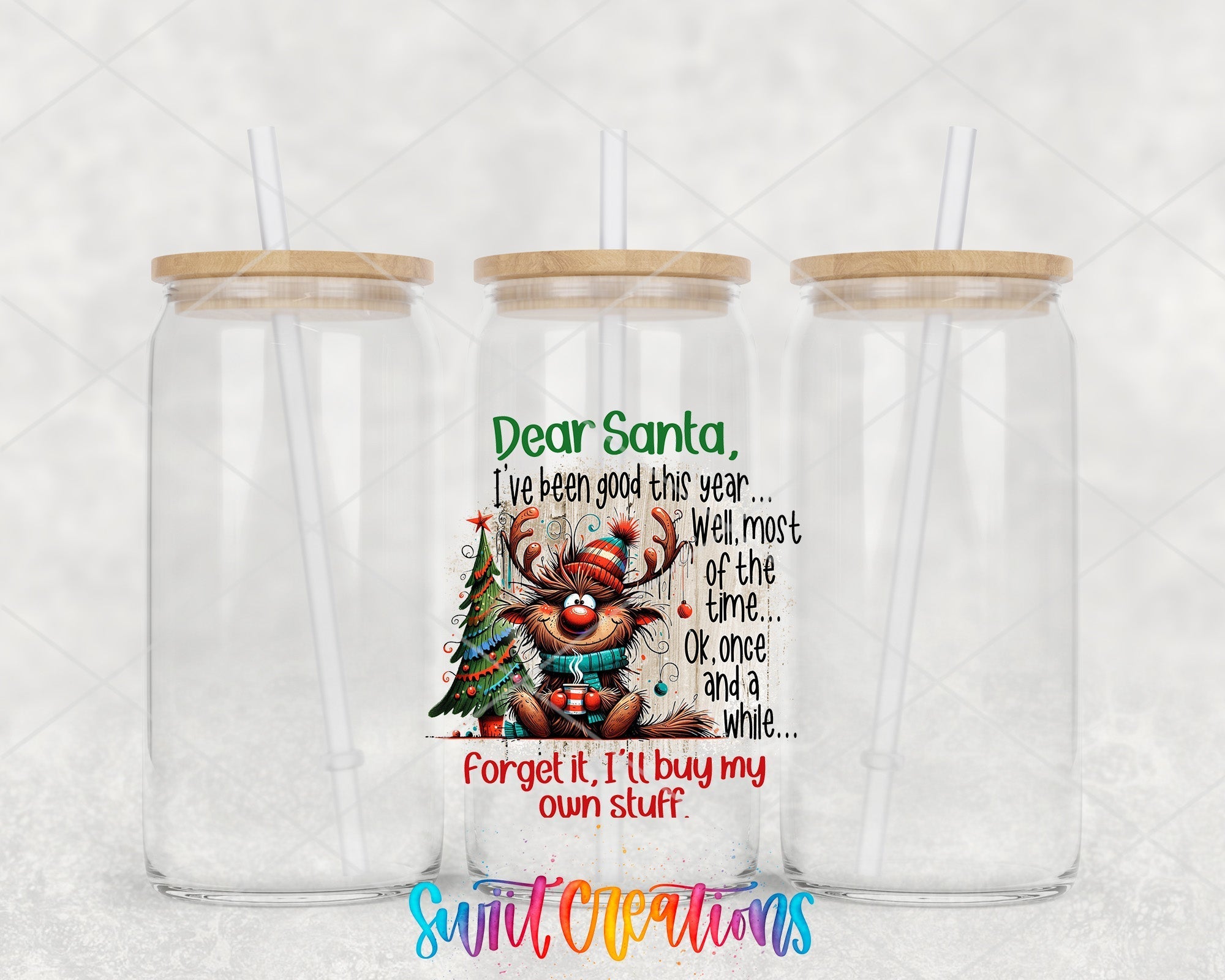 two clear tumblers with a picture of a bear holding a christmas tree