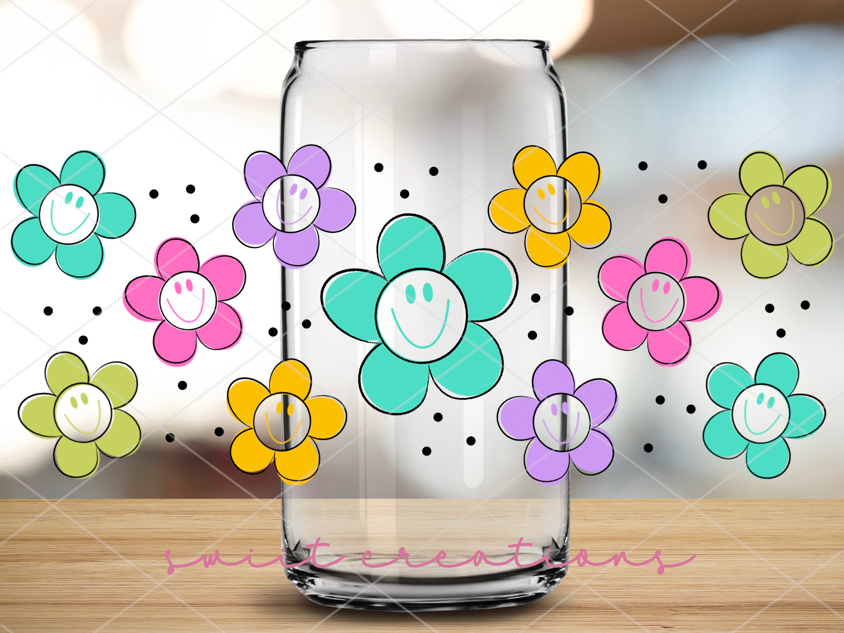 a glass vase with flowers painted on it