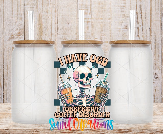 two white coffee mugs with a skeleton holding two drinks