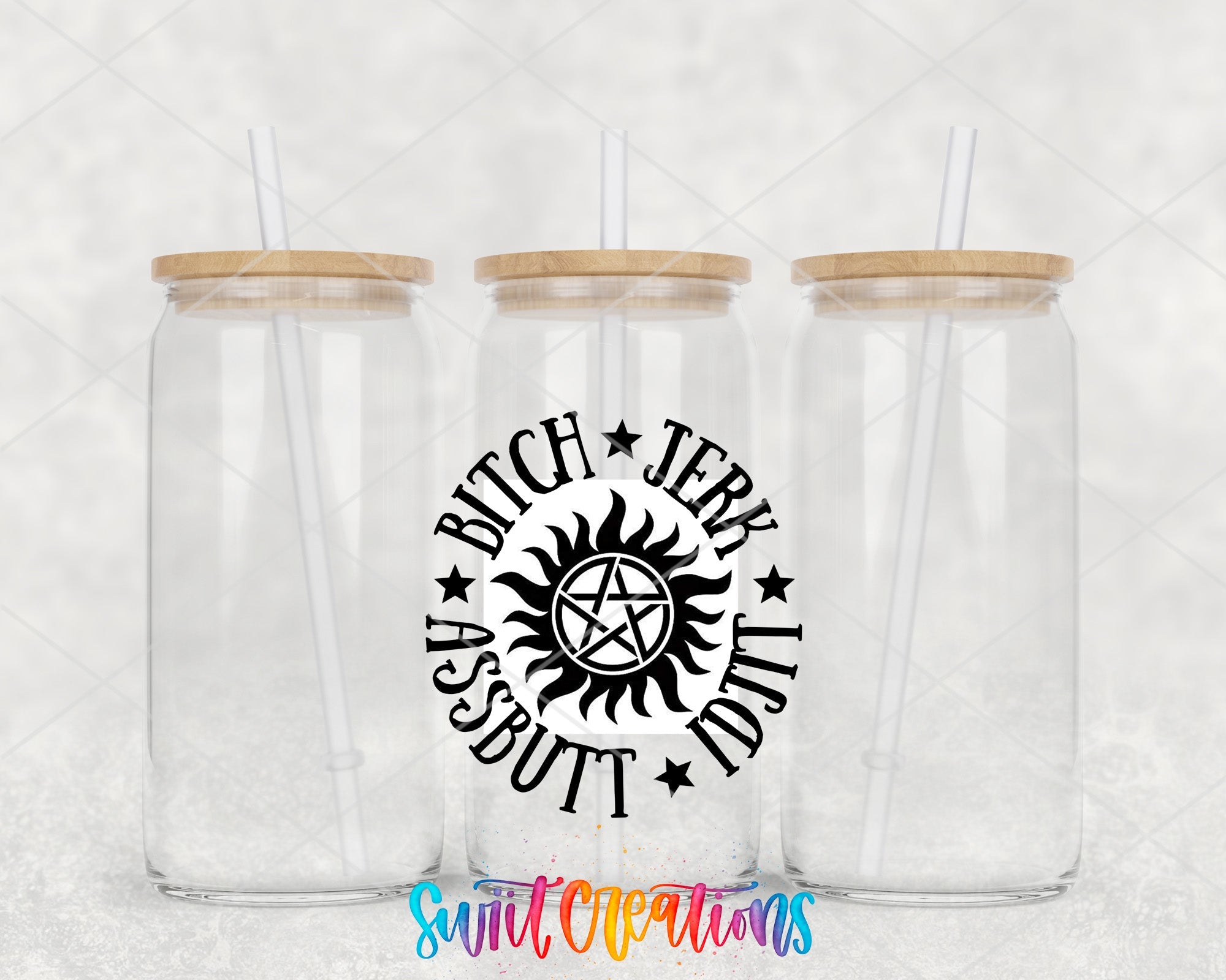two clear mason jars with wooden lids and straws