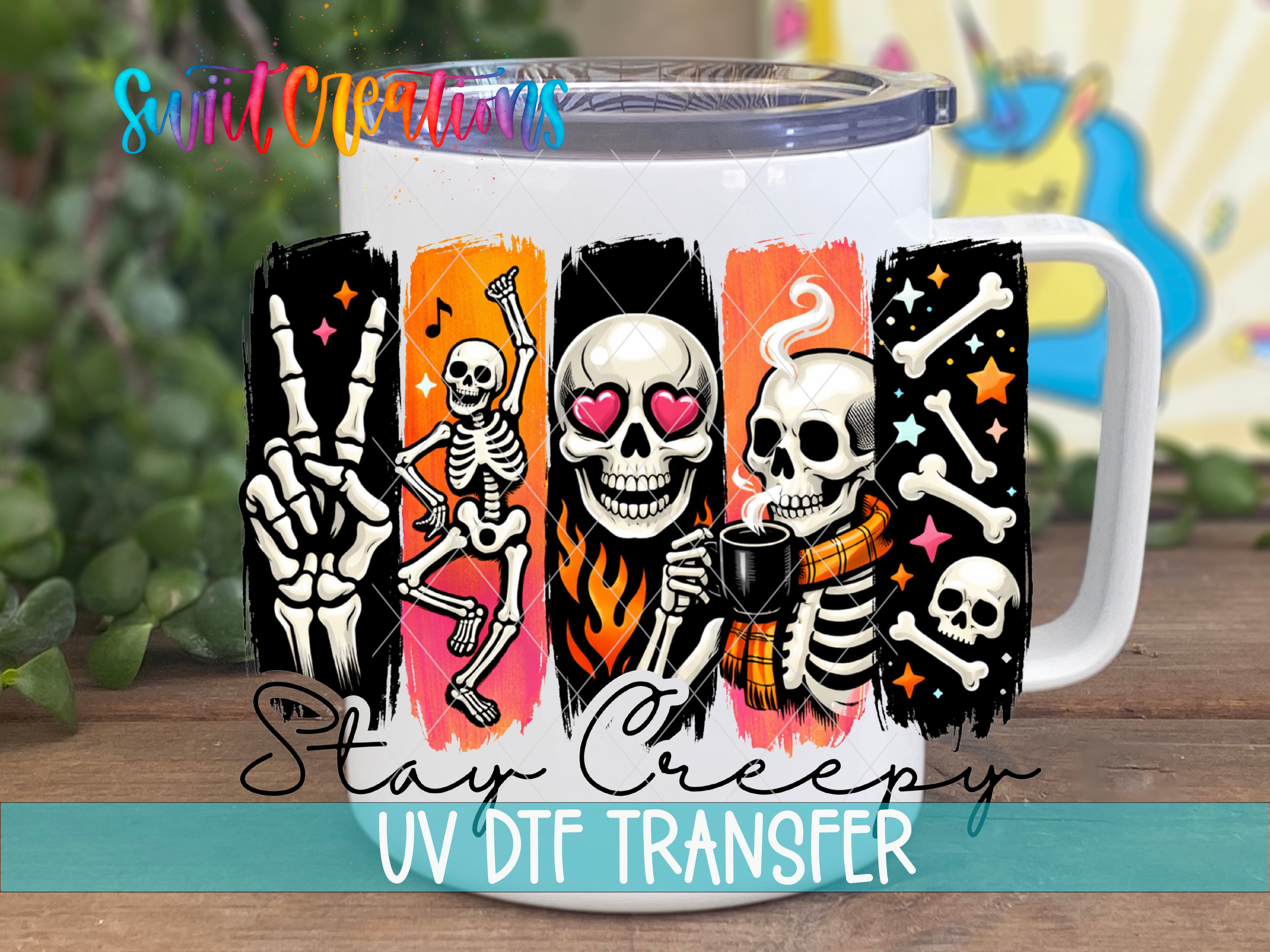 White mug mockup with the Swiit Creations Stay Creepy UV DTF transfer featuring colorful skeletons, skulls, bones, and stars.
