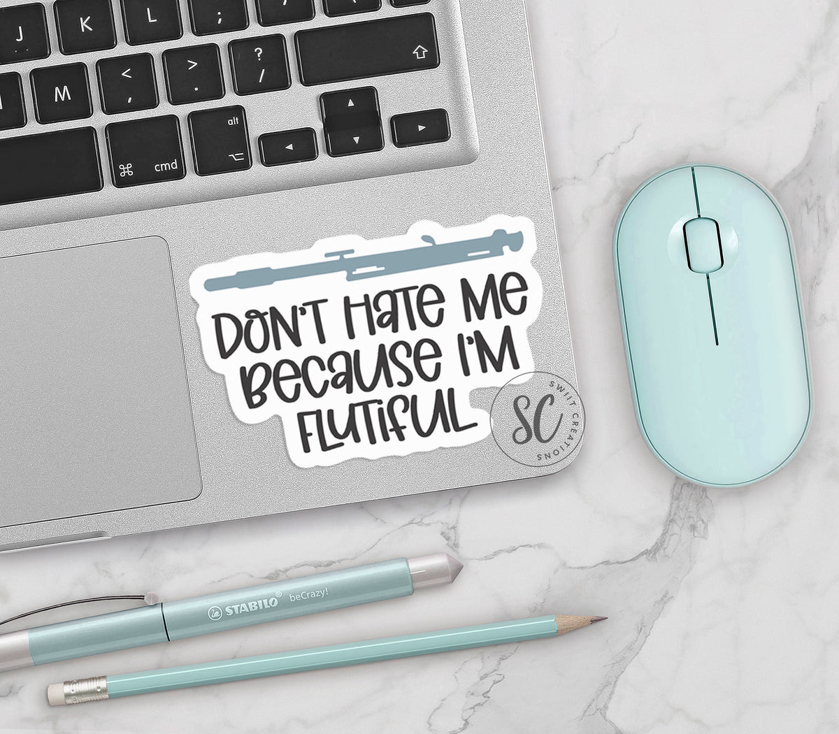 a sticker that says don't hate me because i'm flutist