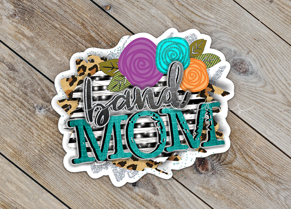 Close-up of the Leopard Floral Band Mom sticker on rustic wood