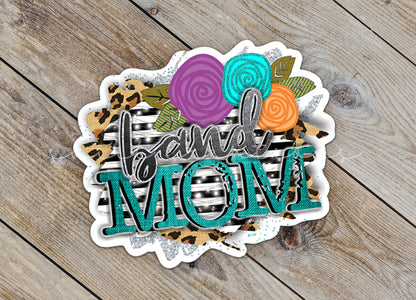 Close-up of the Leopard Floral Band Mom sticker on rustic wood