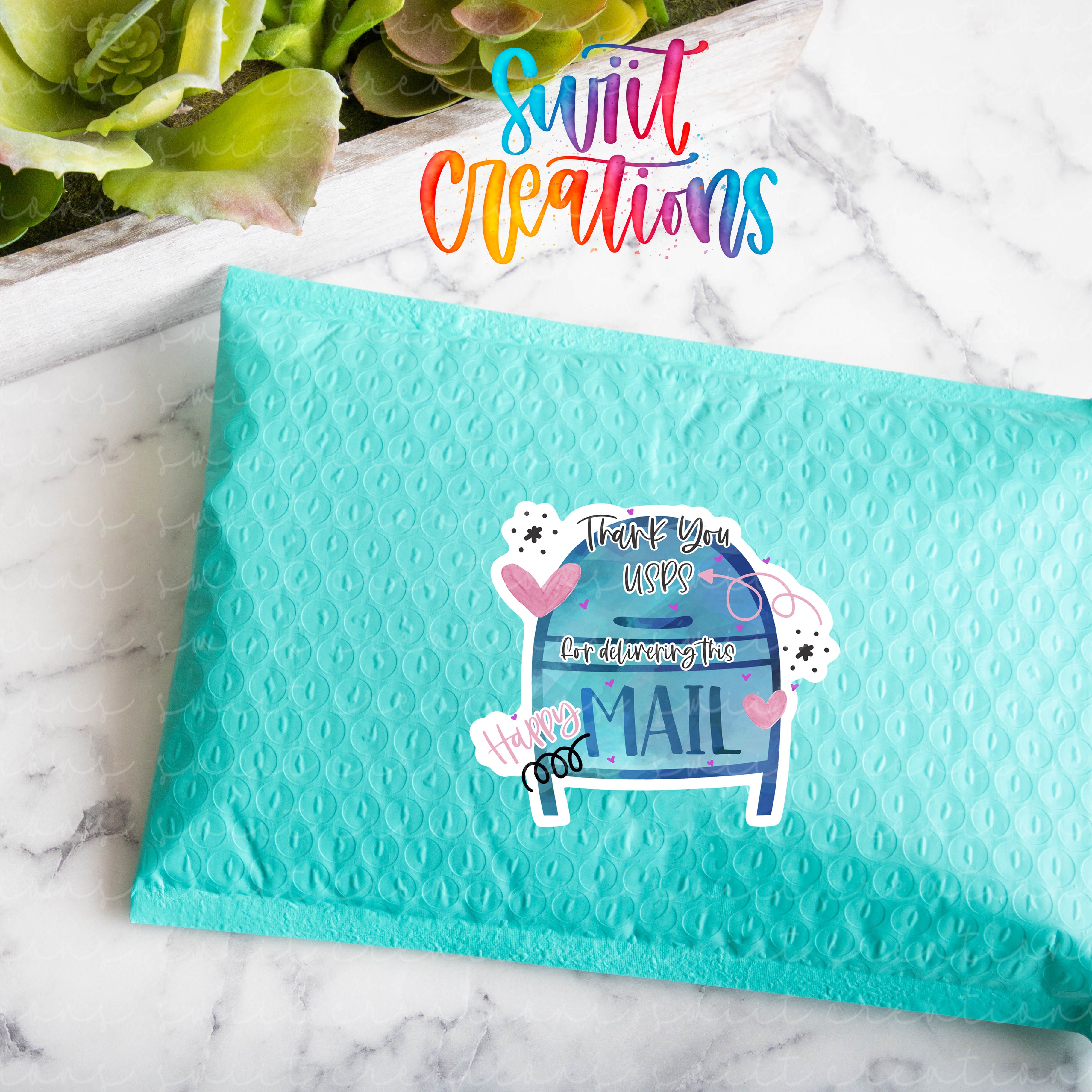 a blue envelope with a sticker on it