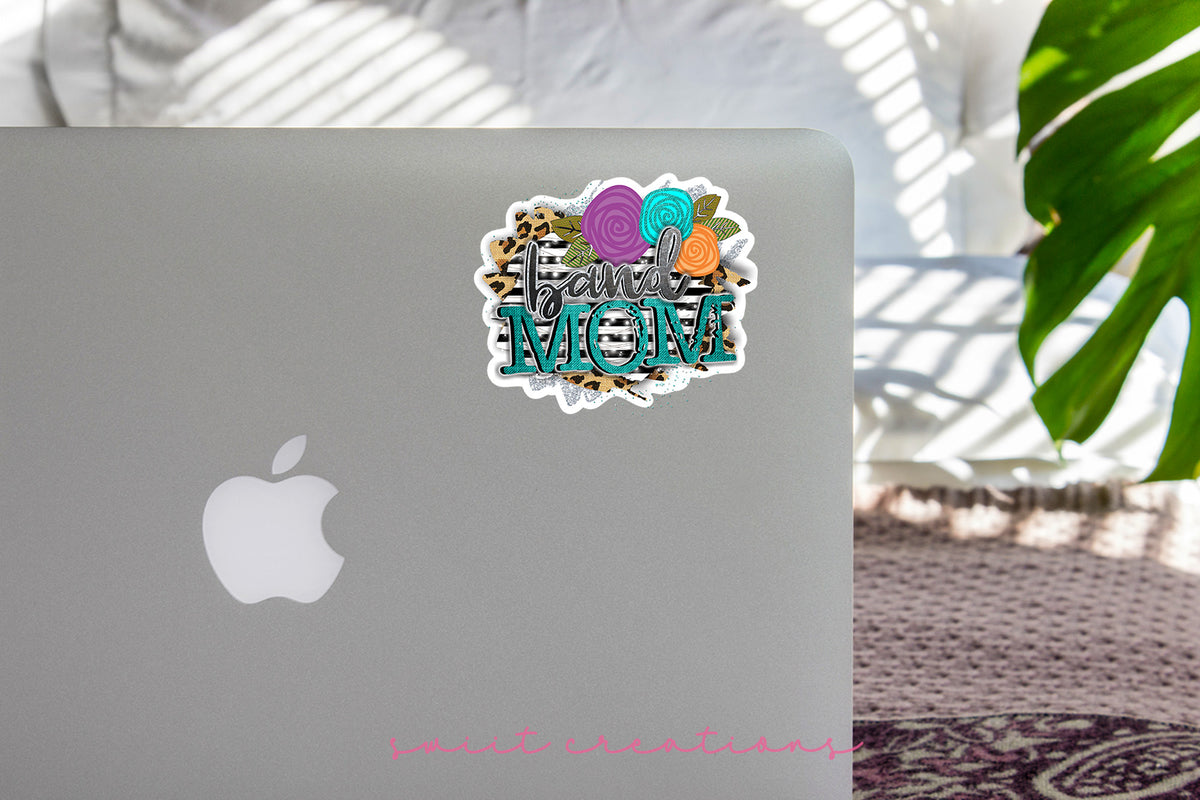 Leopard Floral Band Mom sticker on the lid of a silver laptop