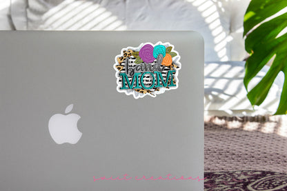 Leopard Floral Band Mom sticker on the lid of a silver laptop