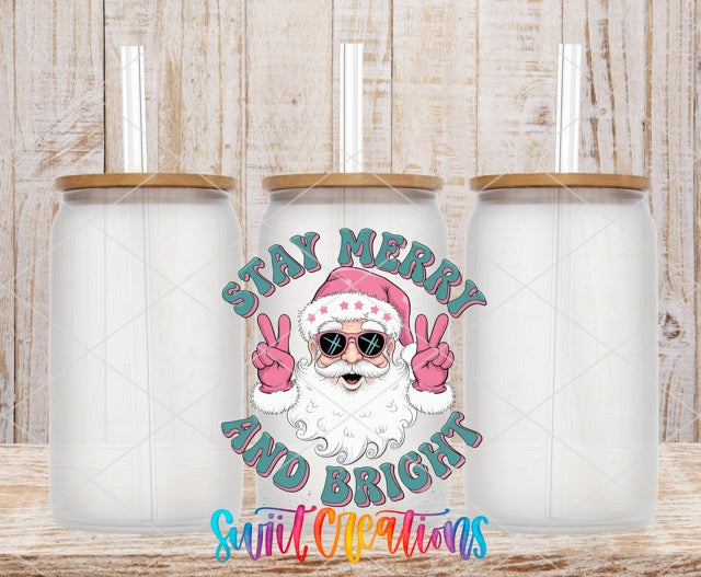 two white coffee mugs with santa clause on them
