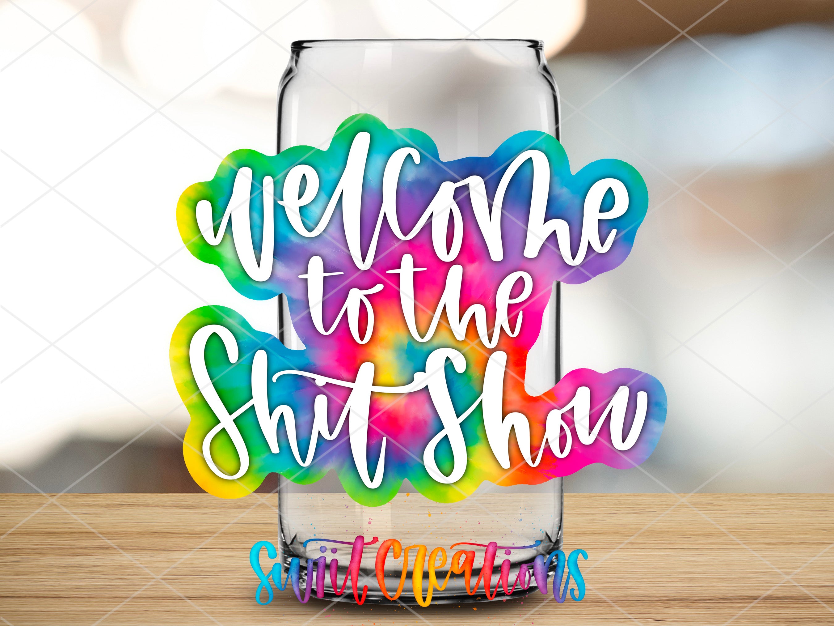 a glass with the words welcome to the shit show on it