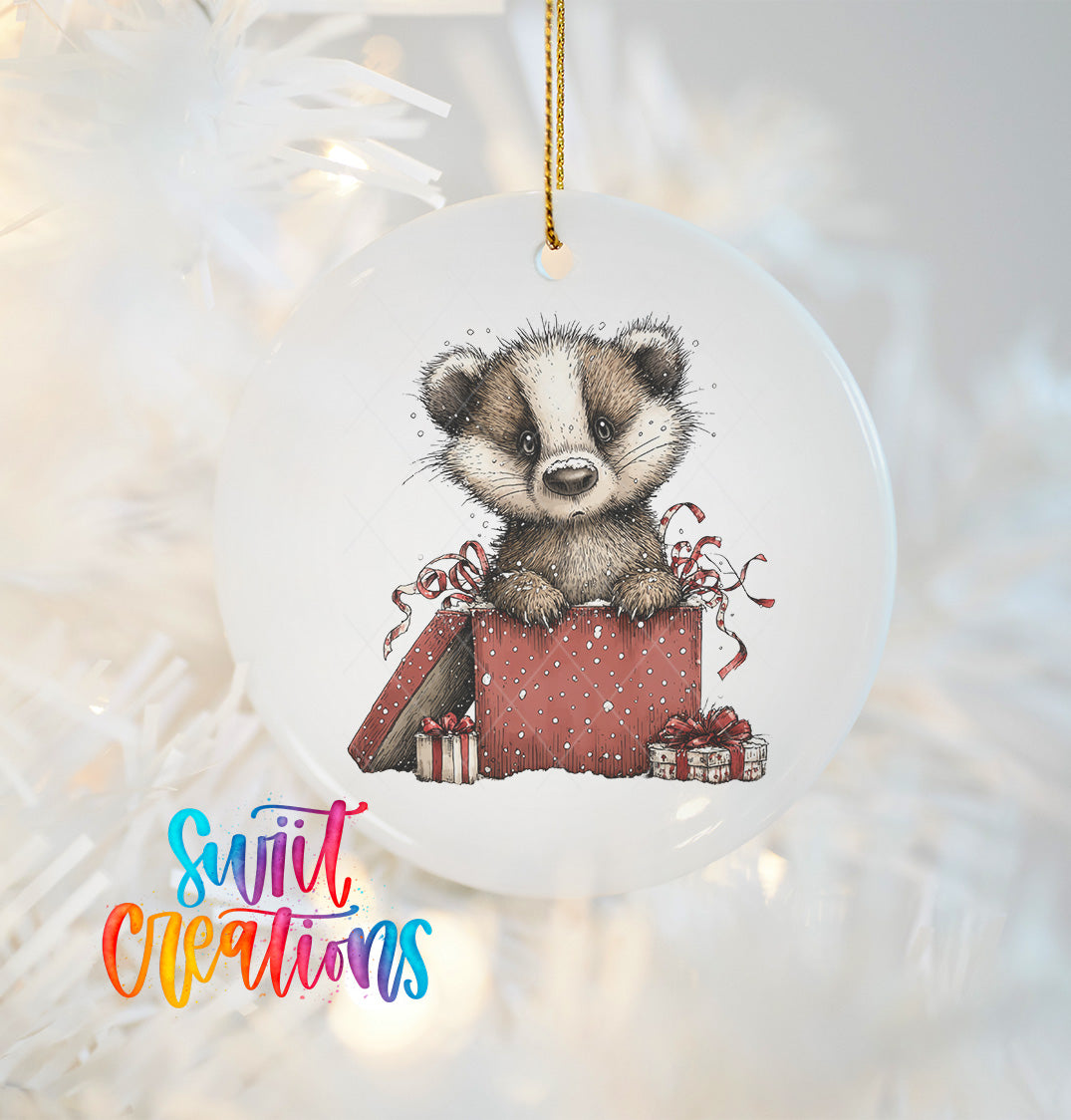 A ceramic ornament featuring a cartoon badger sitting inside a gift box, surrounded by presents and ribbons.