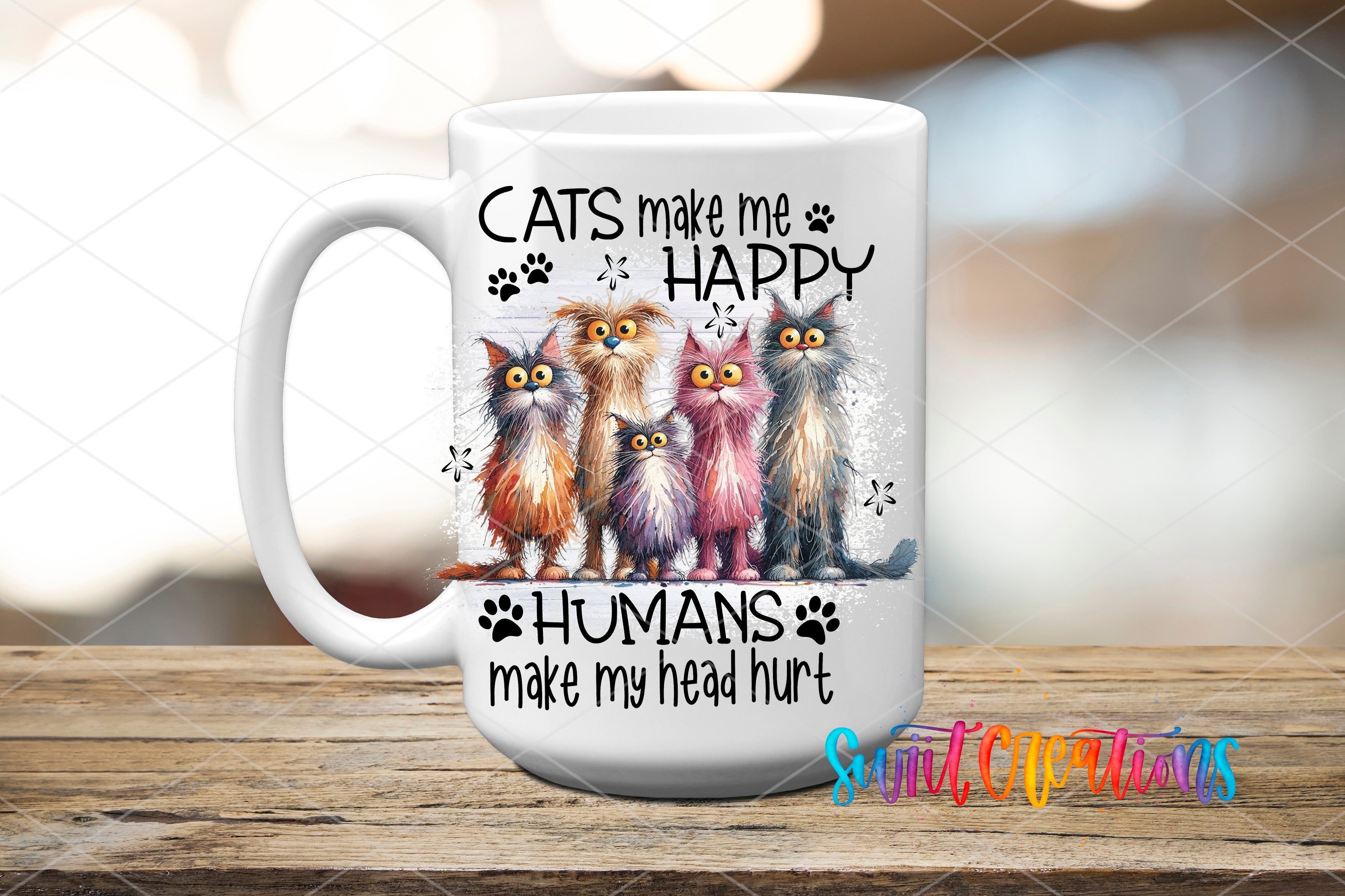 A white ceramic mug with a printed design featuring a group of cats and the text "CATS make me HAPPY humans make my head hurt".