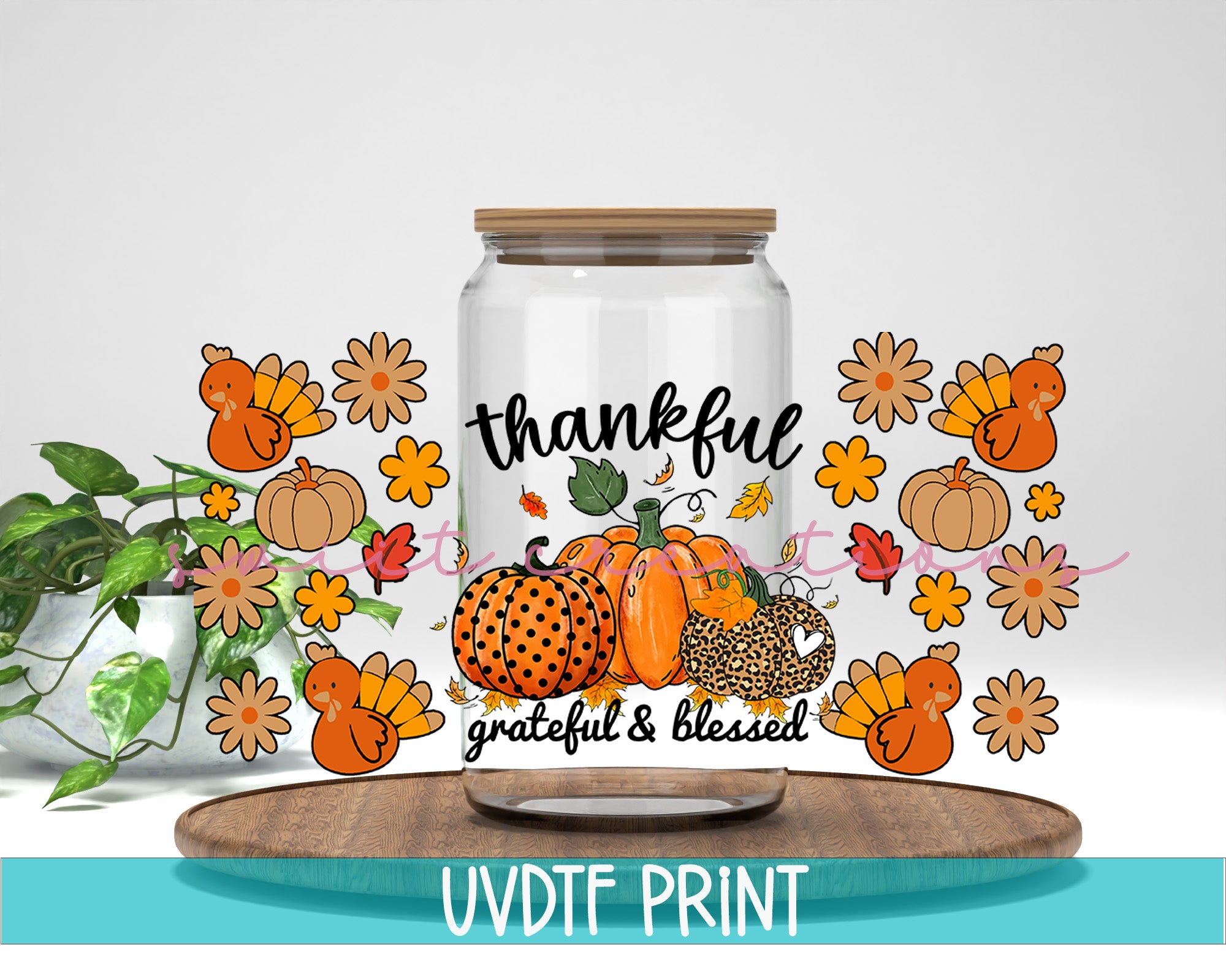 a jar filled with pumpkins sitting on top of a wooden table