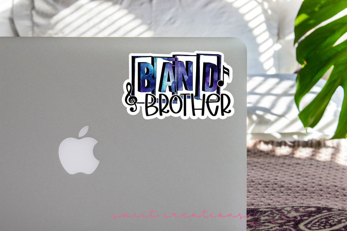 Blue Band Brother sticker on the lid of a silver laptop