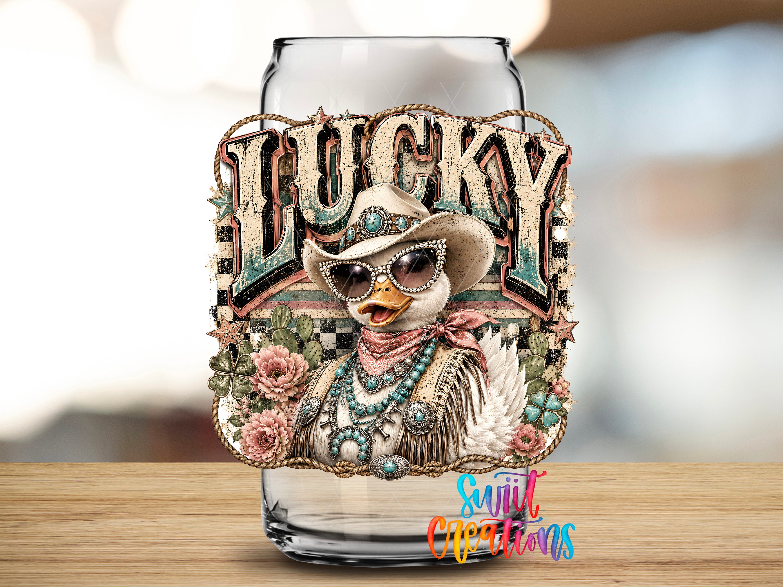 a glass jar or container with a decorative label or sticker on it. The label has a cartoon image of a duck wearing sunglasses and a cowboy hat, surrounded by various decorative elements such as flowers and a ribbon.
