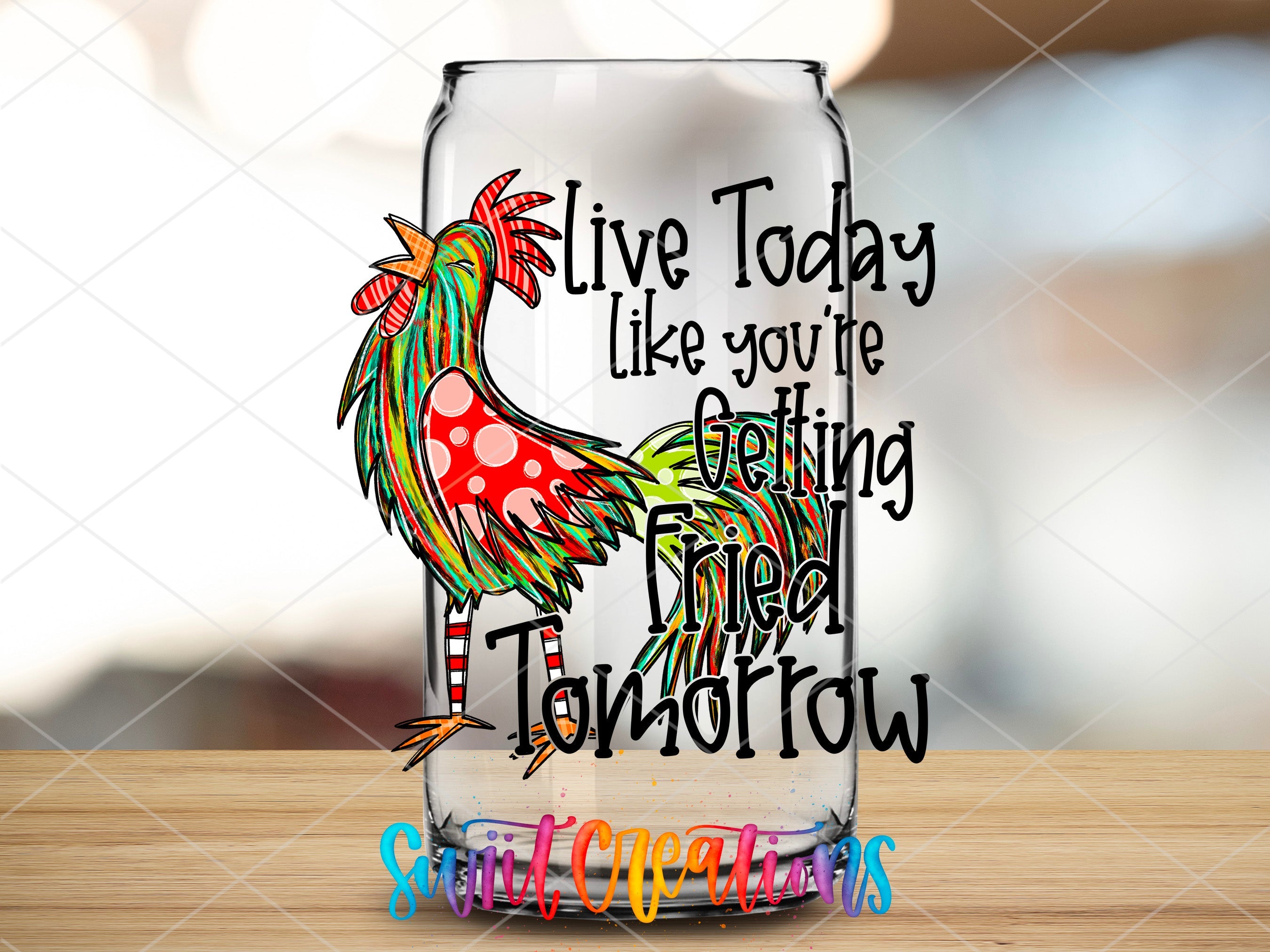 a glass with a rooster painted on it