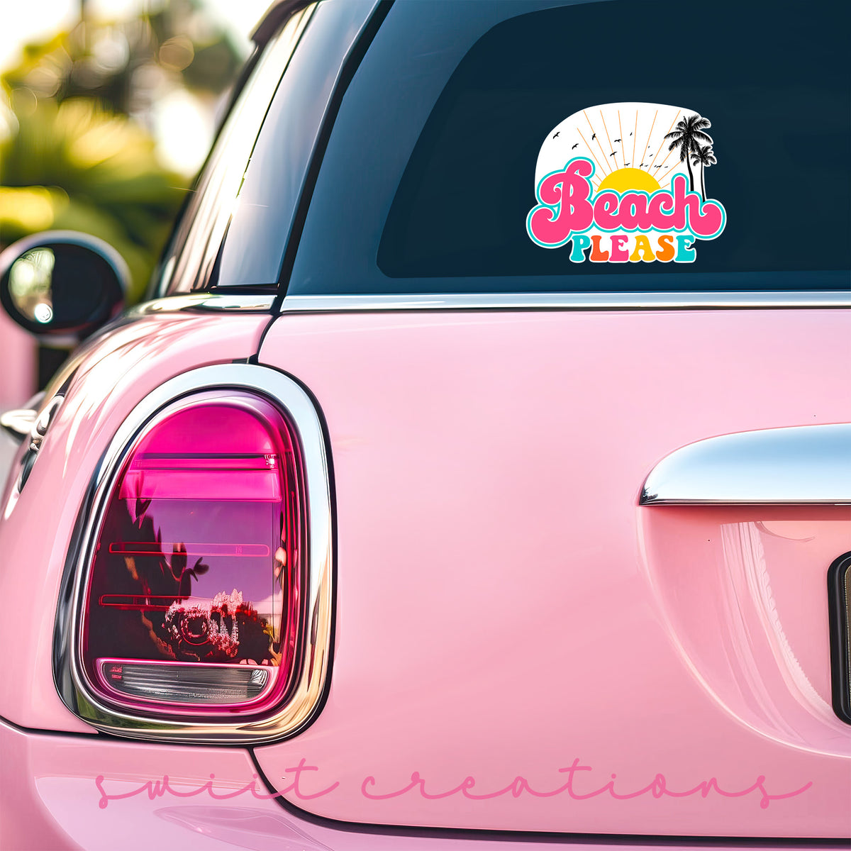 Beach Please sticker on the back window of a pink car