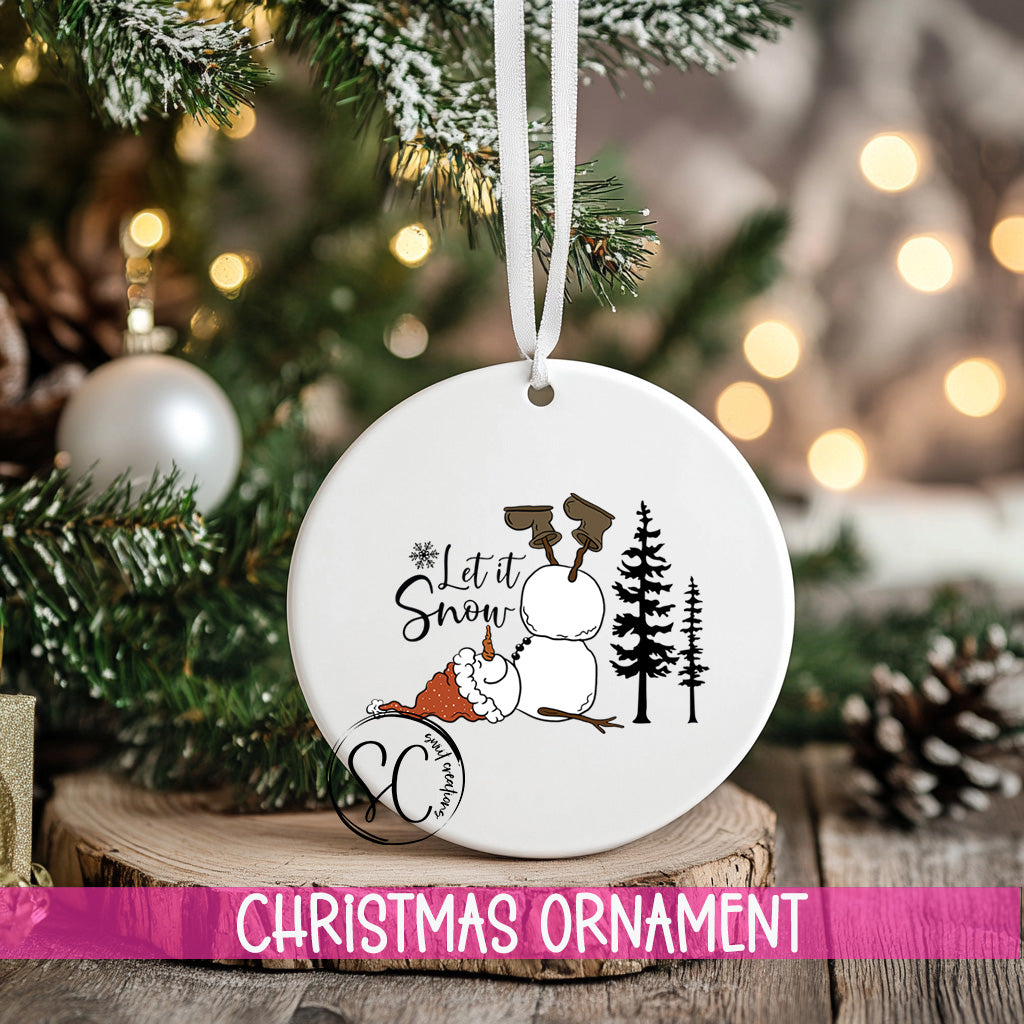 a christmas ornament hanging from a christmas tree