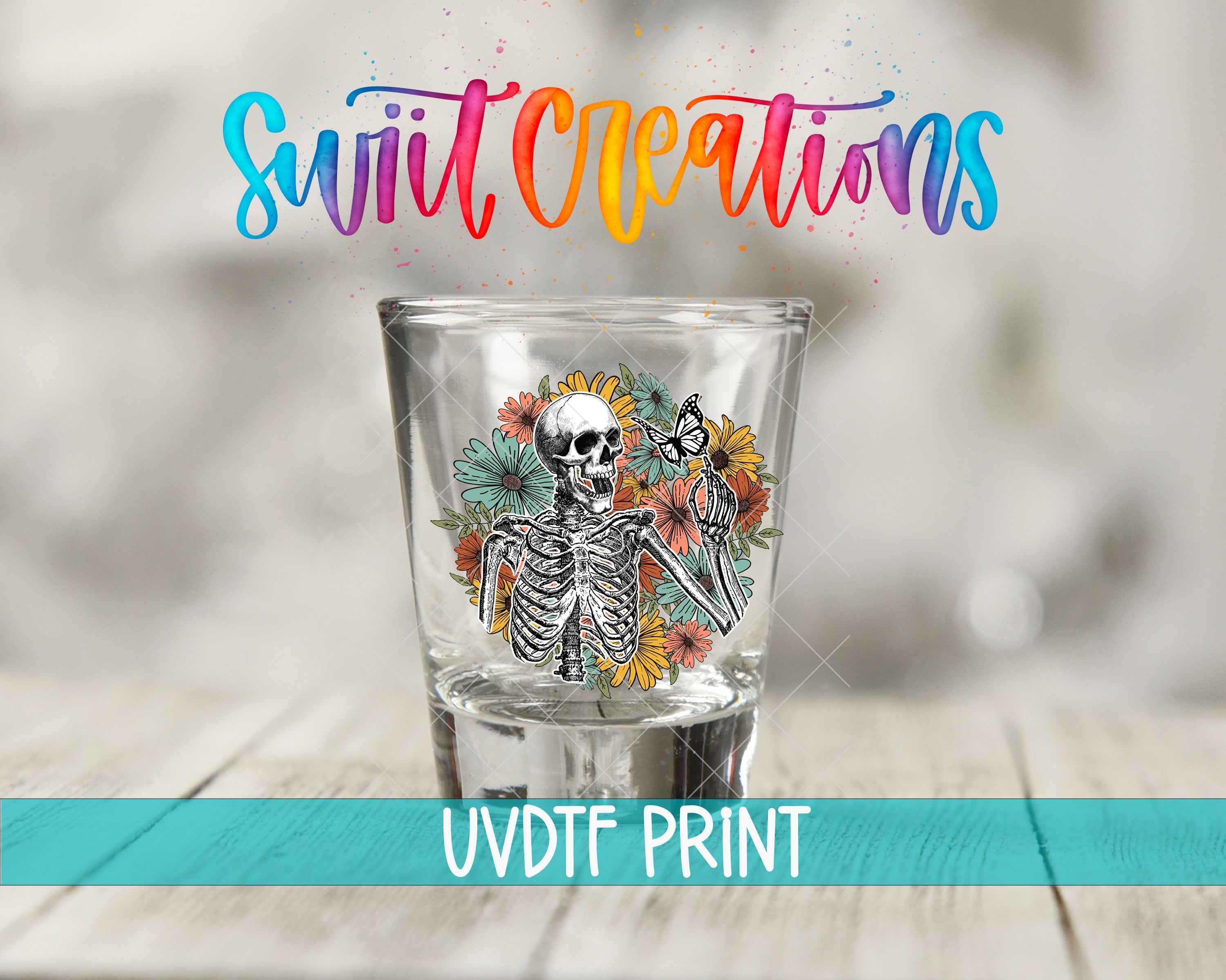 a shot glass with a picture of a skeleton on it