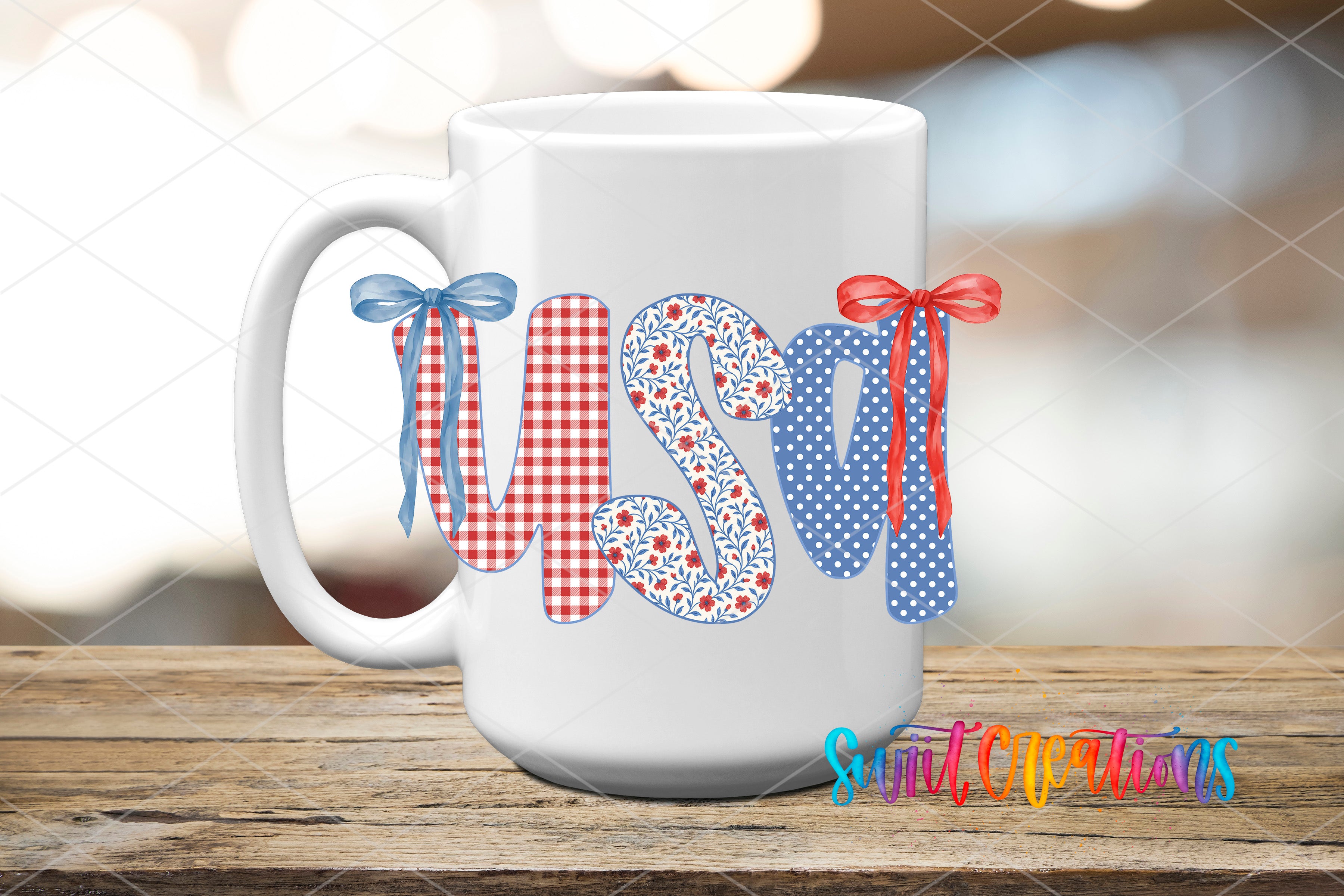 A white mug with the word "USA" written on it in a patriotic style, featuring red, white, and blue colors and decorative bows.