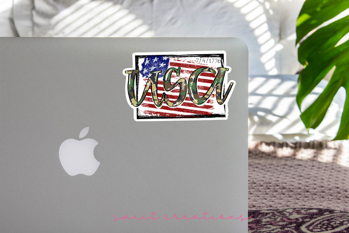 USA Camo sticker on the lid of a silver laptop