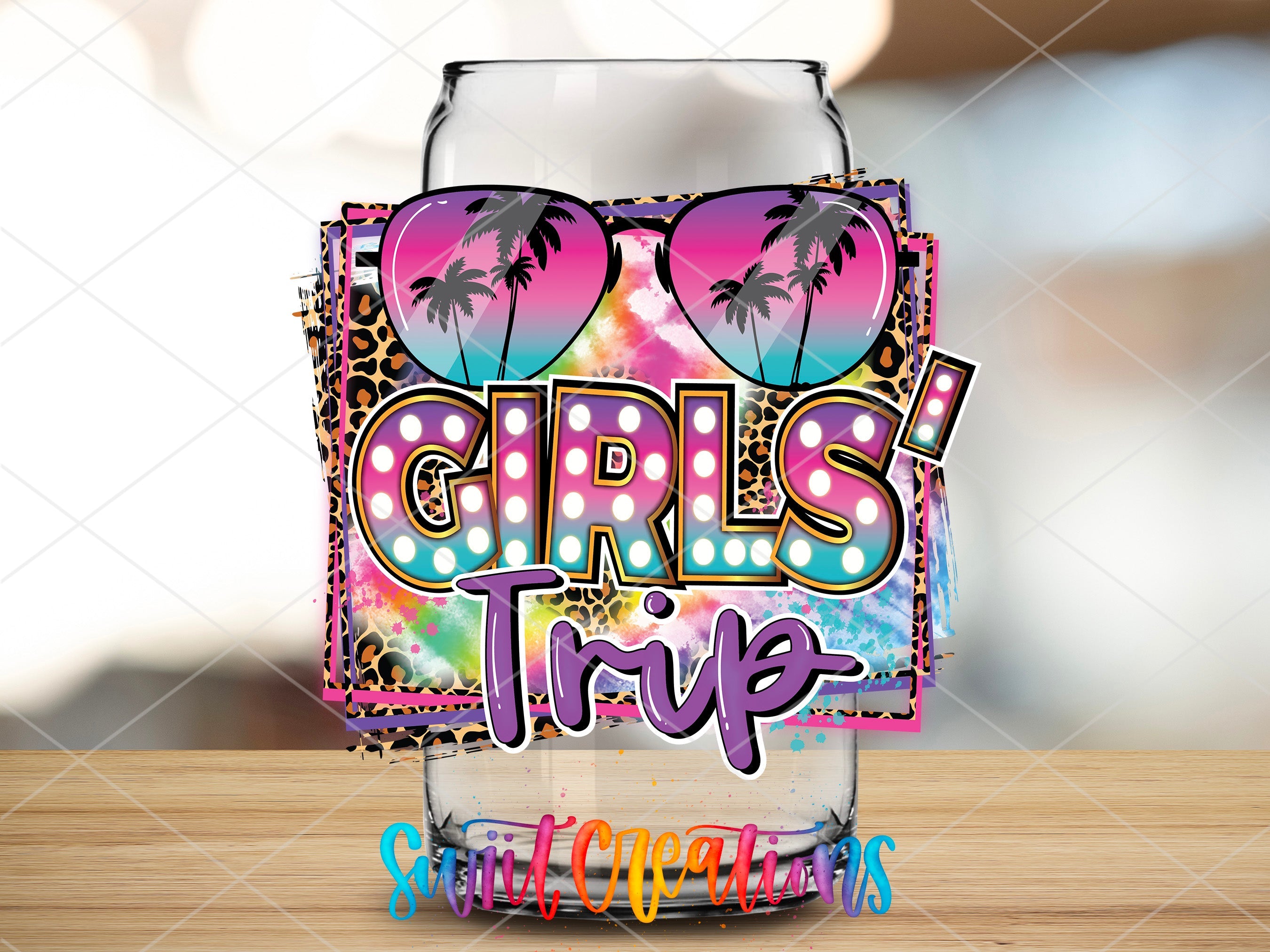 a glass with the words girls trip written on it