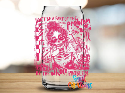 Close-up of the Be the Whole Problem UV DTF transfer on a clear glass can
