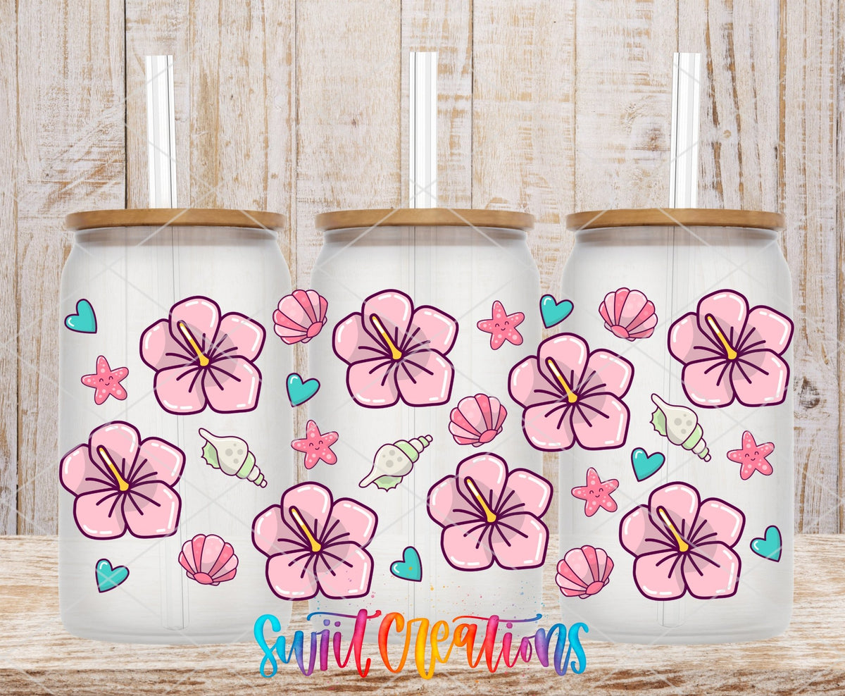 Beach Floral UV DTF full wrap on three clear glass cans with bamboo lids