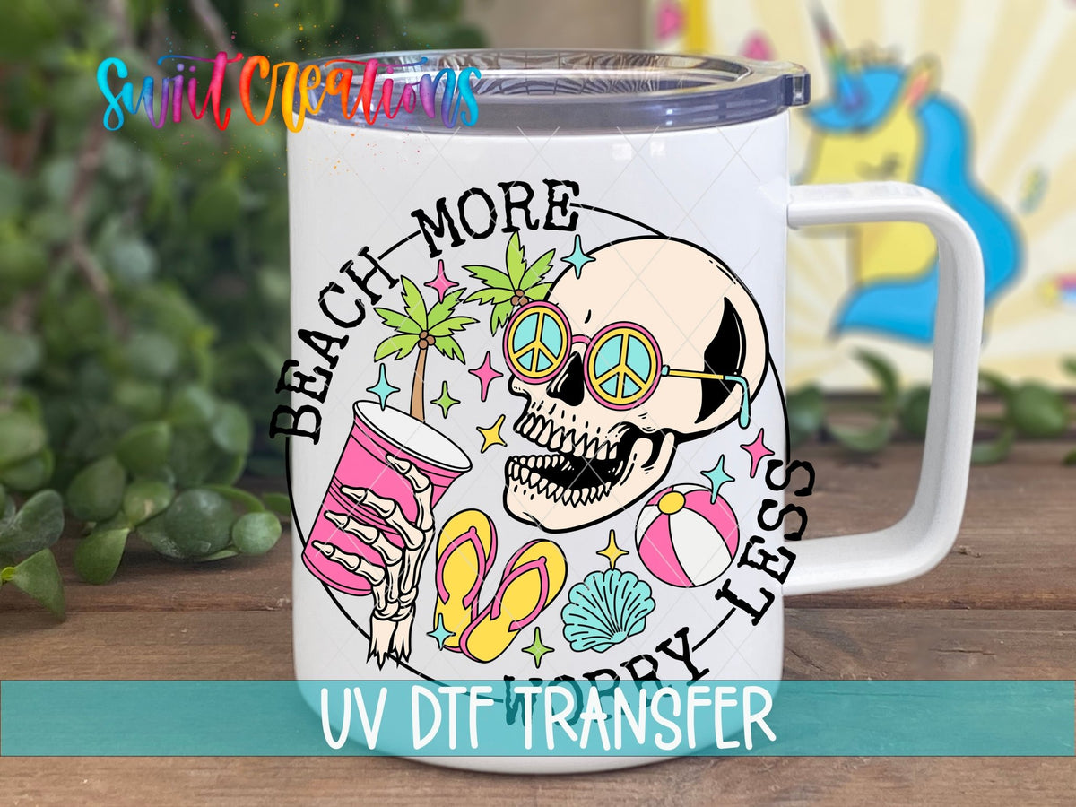Beach More Worry Less skeleton in sunglasses UV DTF transfer on a white stainless steel mug with a lid