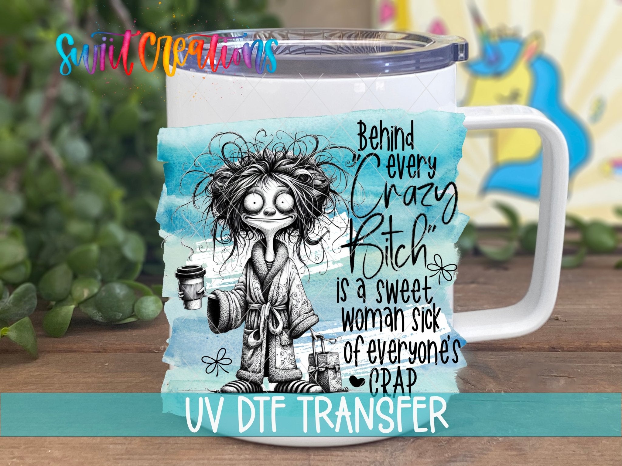 Swiit Creations UV DTF Behind Every Crazy Bitch transfer displayed on a white coffee mug
