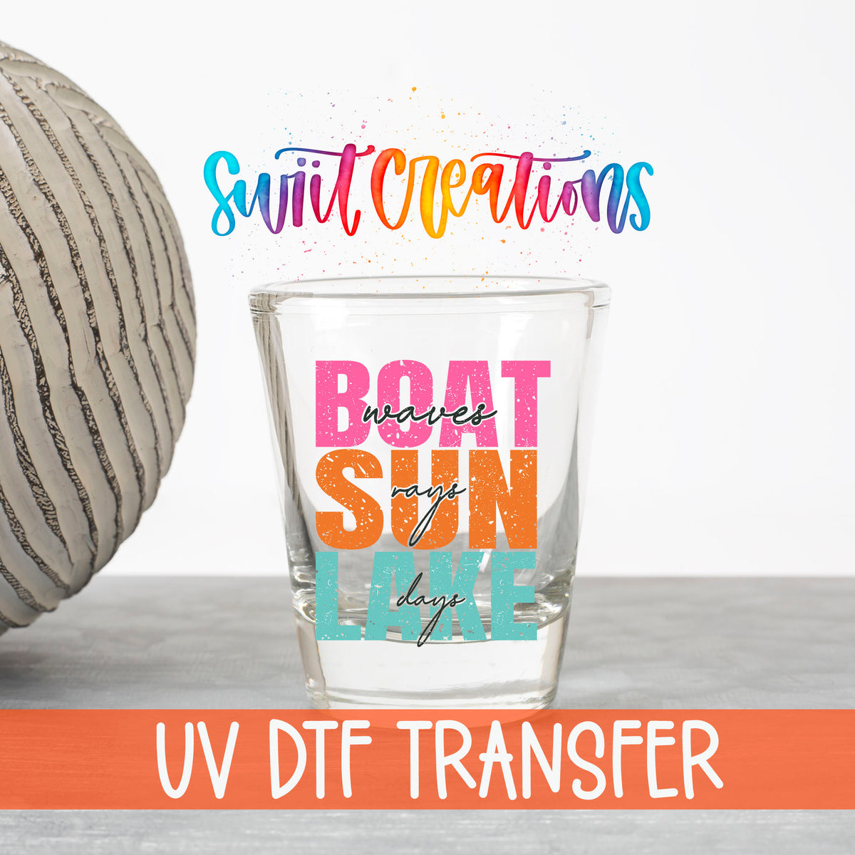 Boat Waves Sun Rays Lake Days UV DTF transfer on a clear shot glass with the Swiit Creations logo and UV DTF Transfer banner