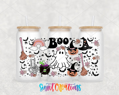 Boo UV DTF wrap on three frosted glass cans