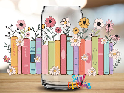 Close-up of the Books and Flowers UV DTF wrap on a clear glass can