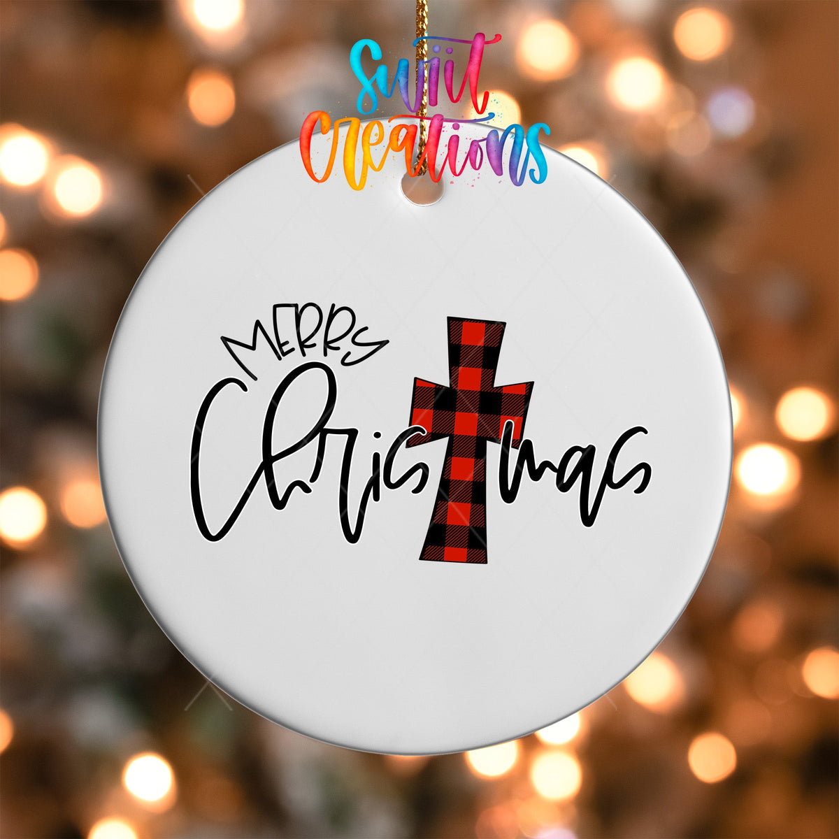 Close-up of the Buffalo Plaid Cross Merry Christmas UV DTF transfer on a round white ornament