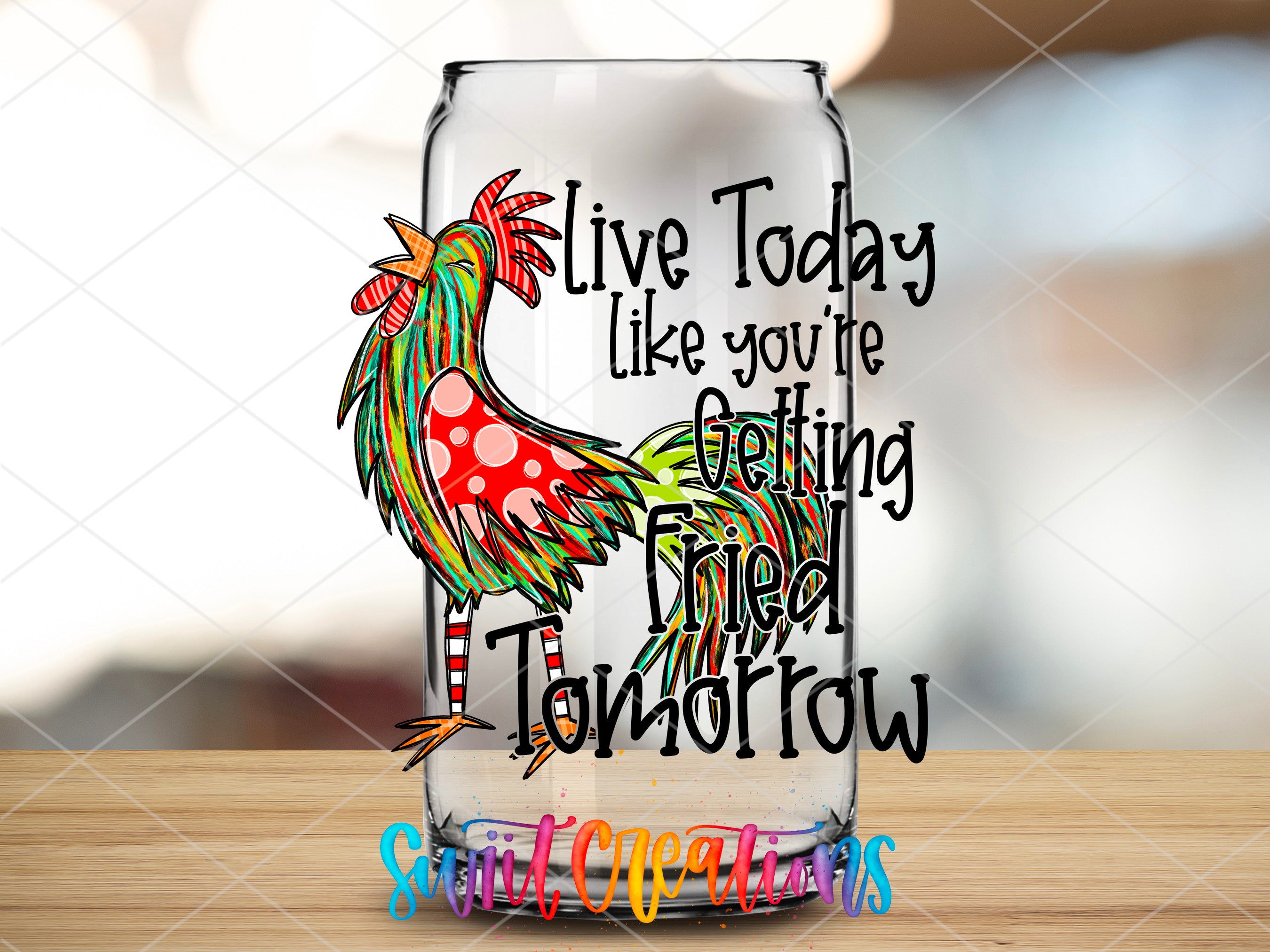 a glass with a rooster painted on it