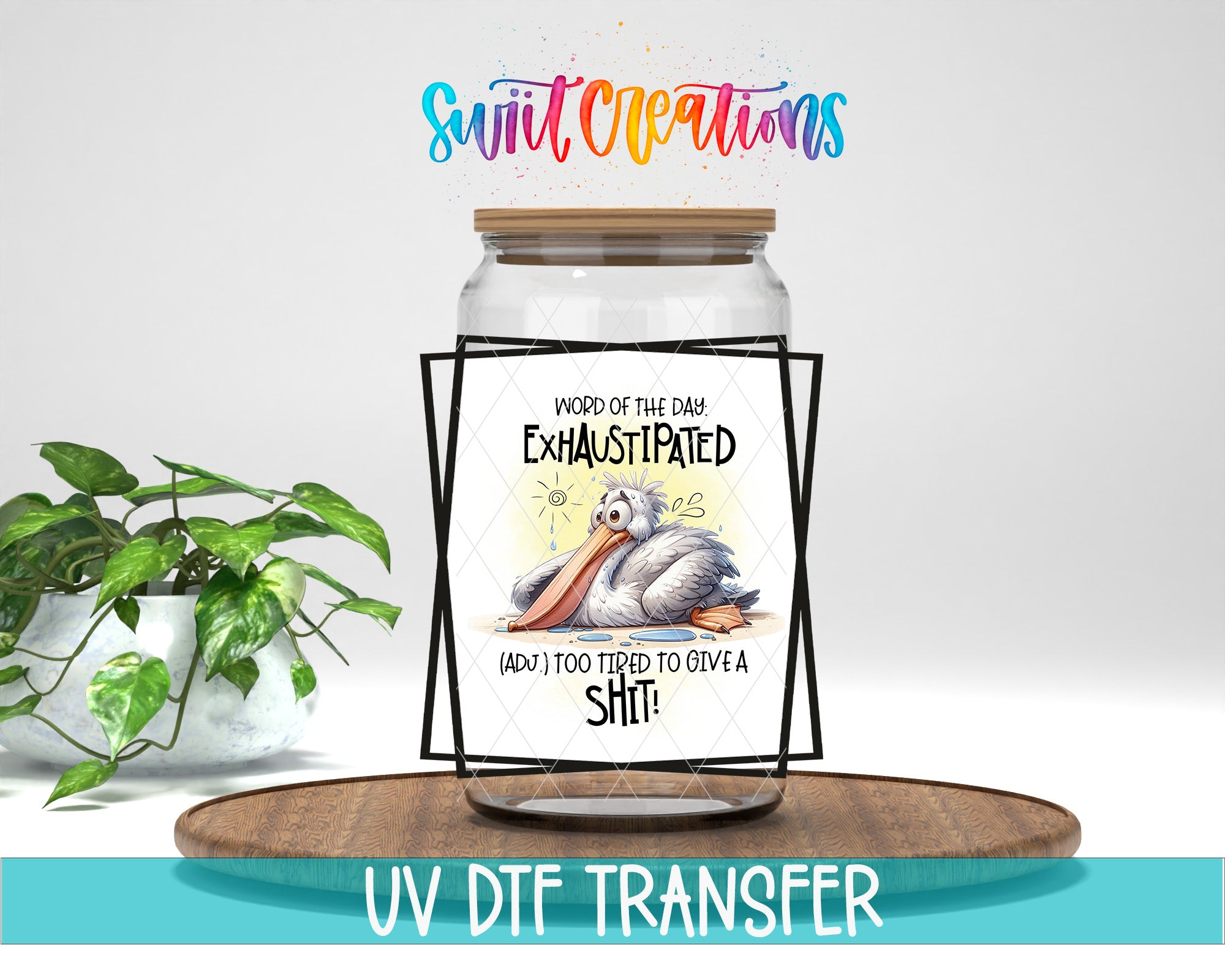 a clear glass jar with a label that includes a cartoon image of a bird and text that says "Word of the day Exhausted (ADO) too tired to give a shit!" The jar is placed on a wooden tray, and there is a potted plant in the background.