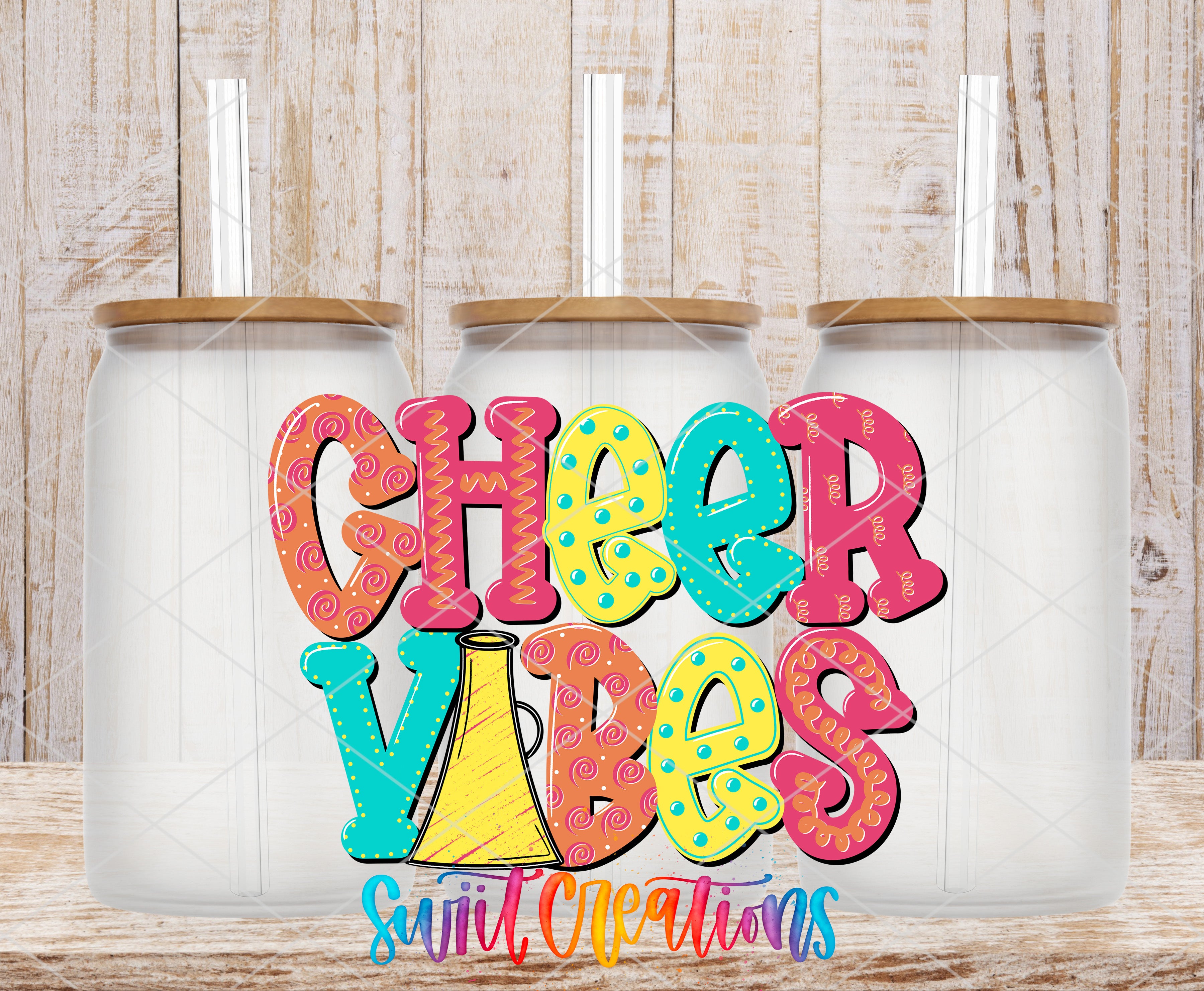 three glass jars with lids, arranged in a row and displaying a colorful text design that says "CHEER VIBES" in a playful and vibrant style.