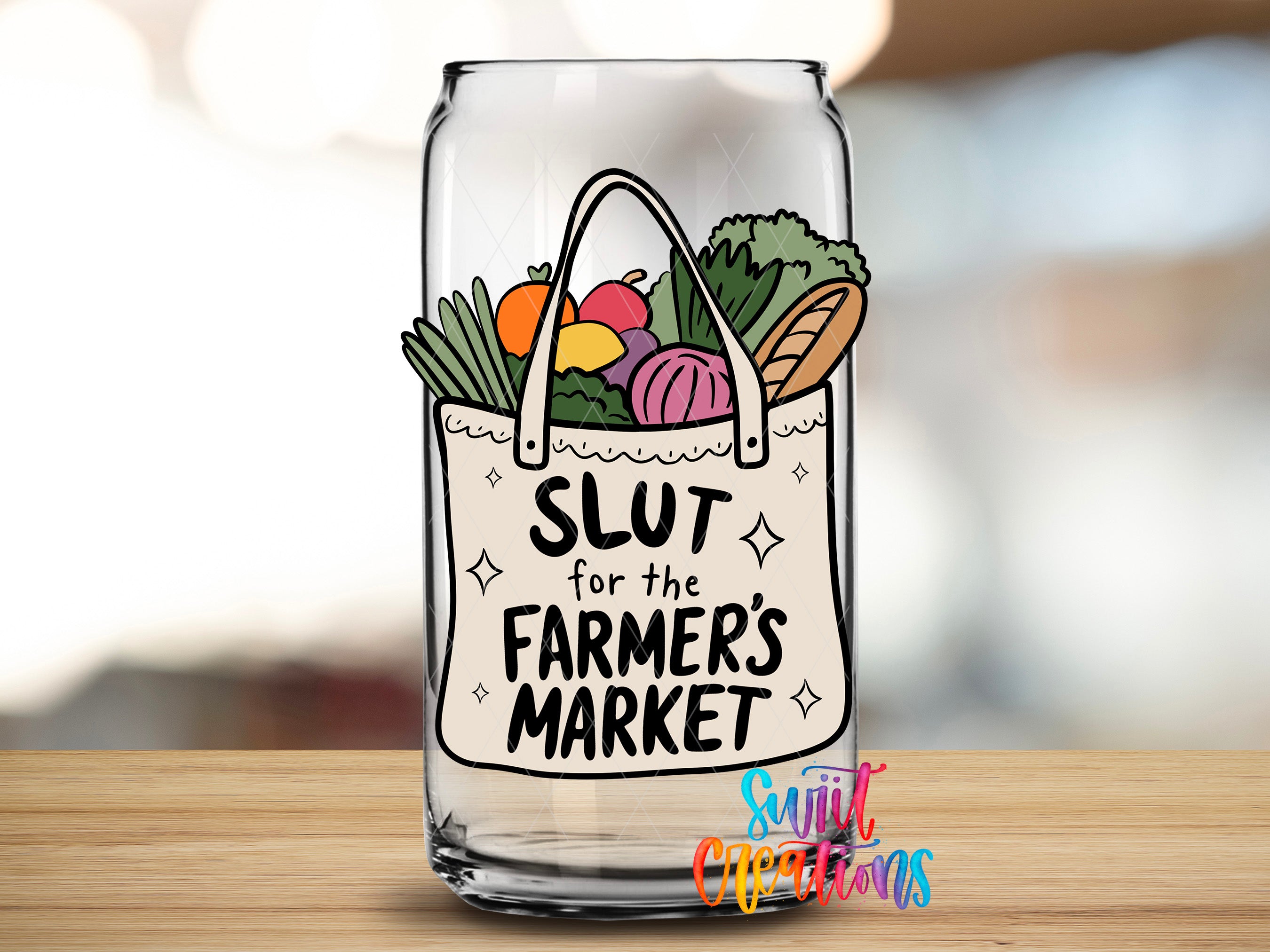 A glass can with a handbag illustration on it, containing various fruits and vegetables, and the text "SLUT for the FARMER'S MARKET" printed on it.