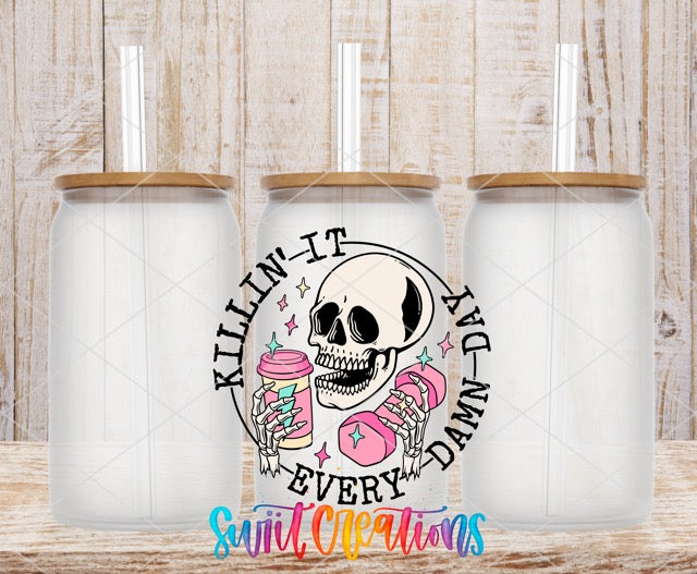 two tumbles with a skull holding a cup of coffee