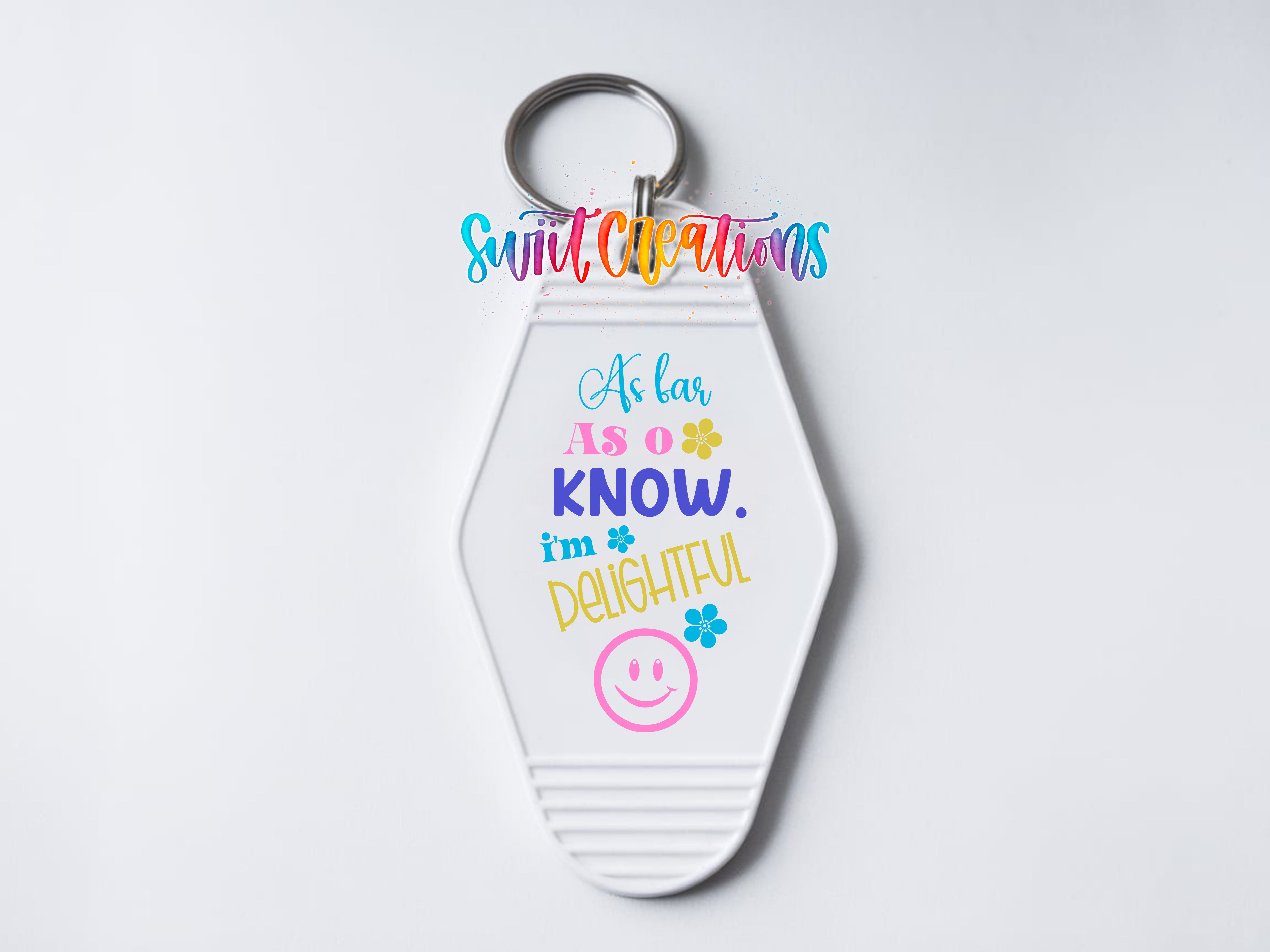 A keychain with a colorful design and text on it.