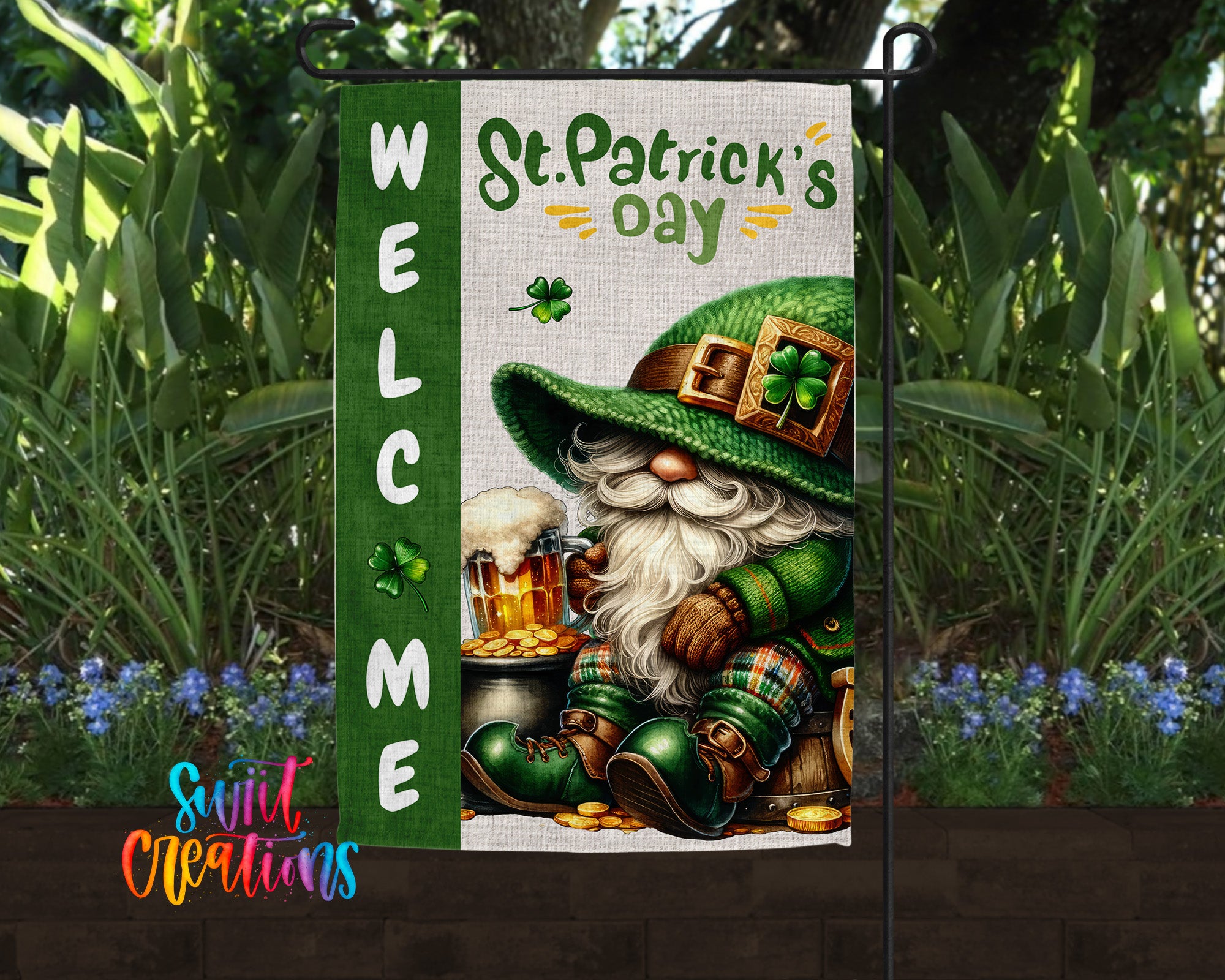 A St. Patrick's Day-themed garden flag featuring a gnome wearing a green hat and holding a pot of gold coins, surrounded by greenery and flowers.