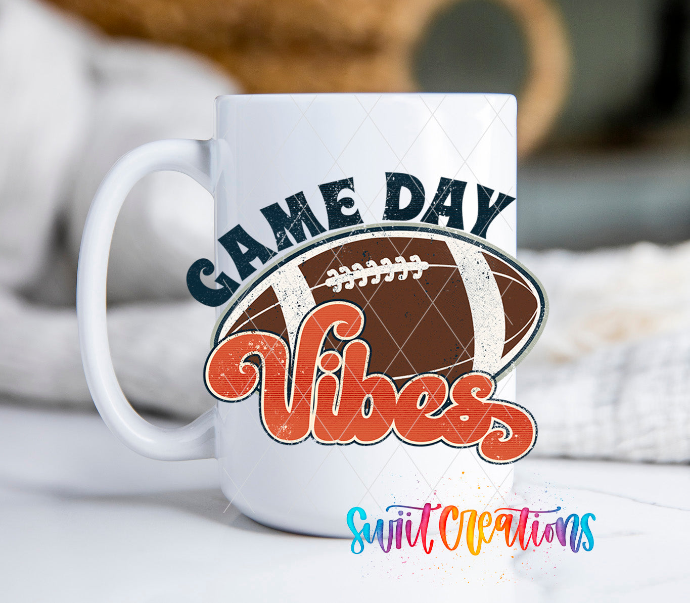 a white coffee mug with a football on it
