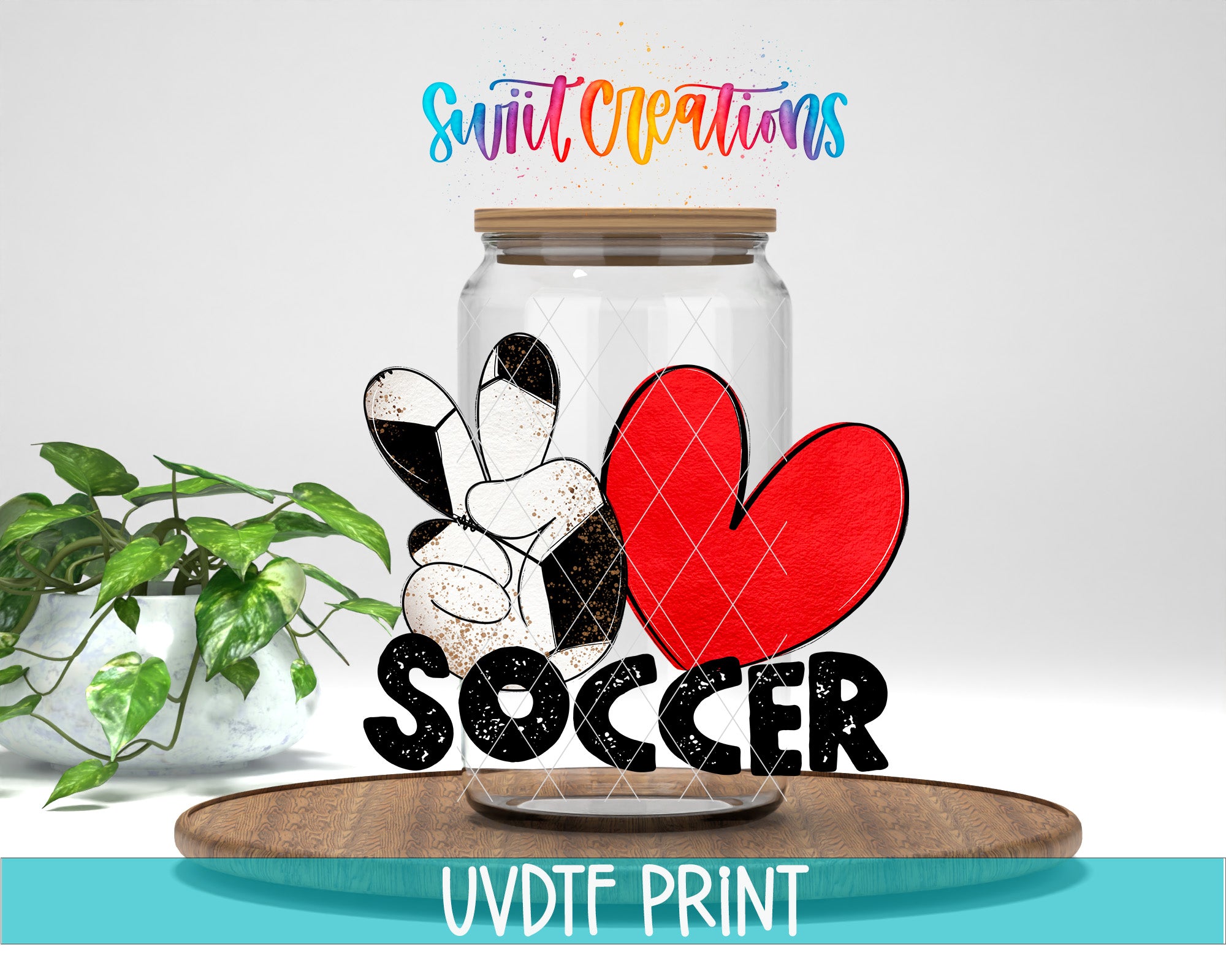 a glass jar with a peace sign and a heart, along with the word "SOCCER" written on it. The jar is placed on a wooden surface, and there is a potted plant in the background.