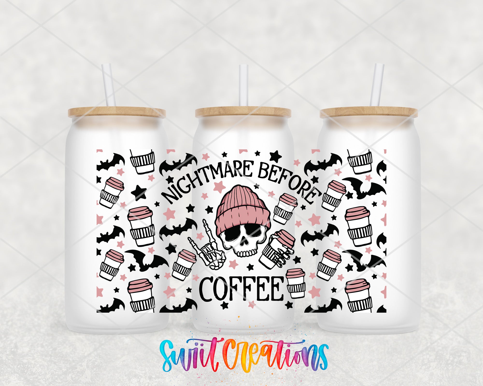 A trio of white tumblers with a unique design featuring a skull wearing a pink beanie and the text "NIGHTMARE BEFORE COFFEE" along with coffee cups and bats.