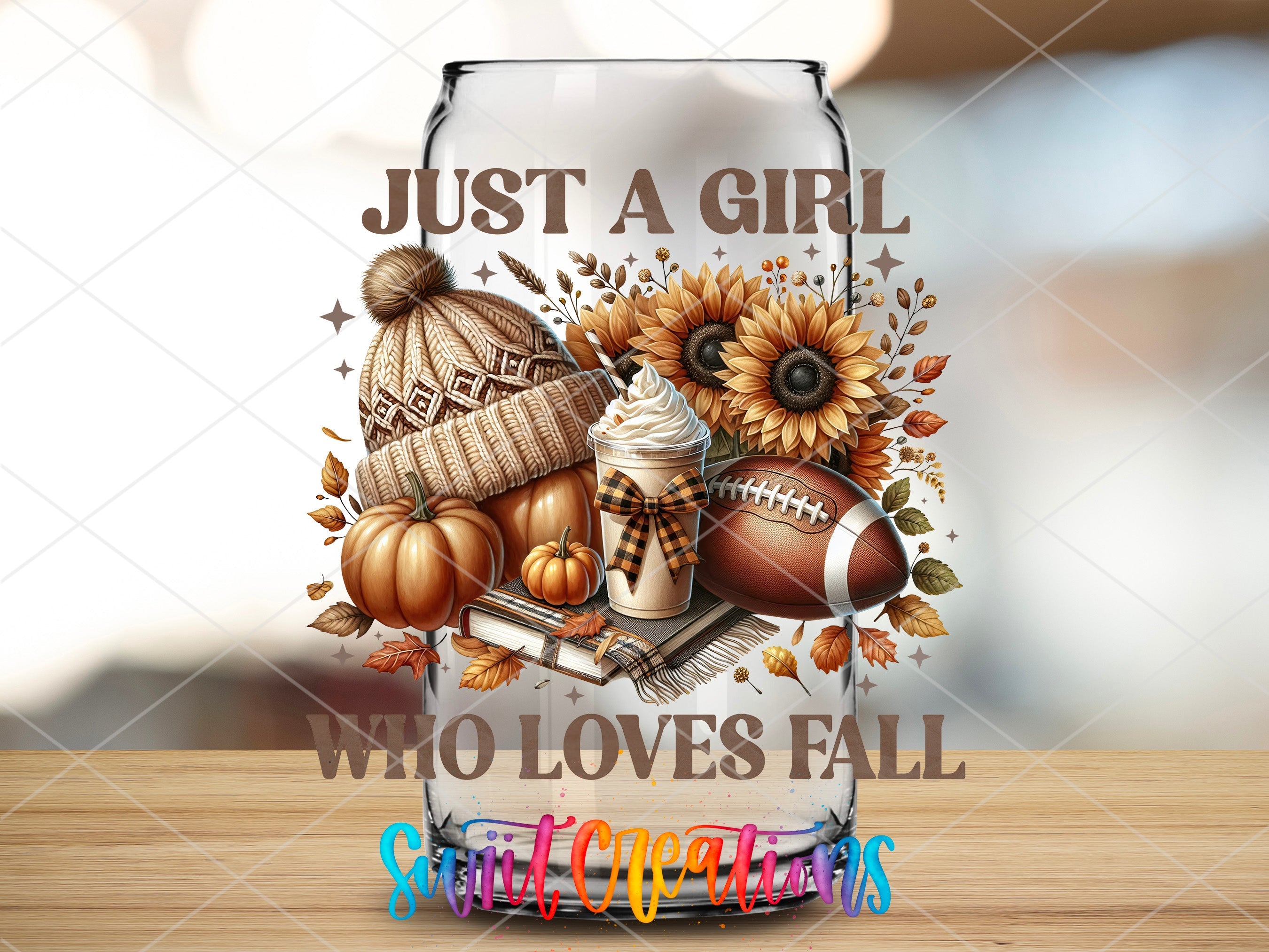 a beer glass with a picture of a football, sunflowers, and a