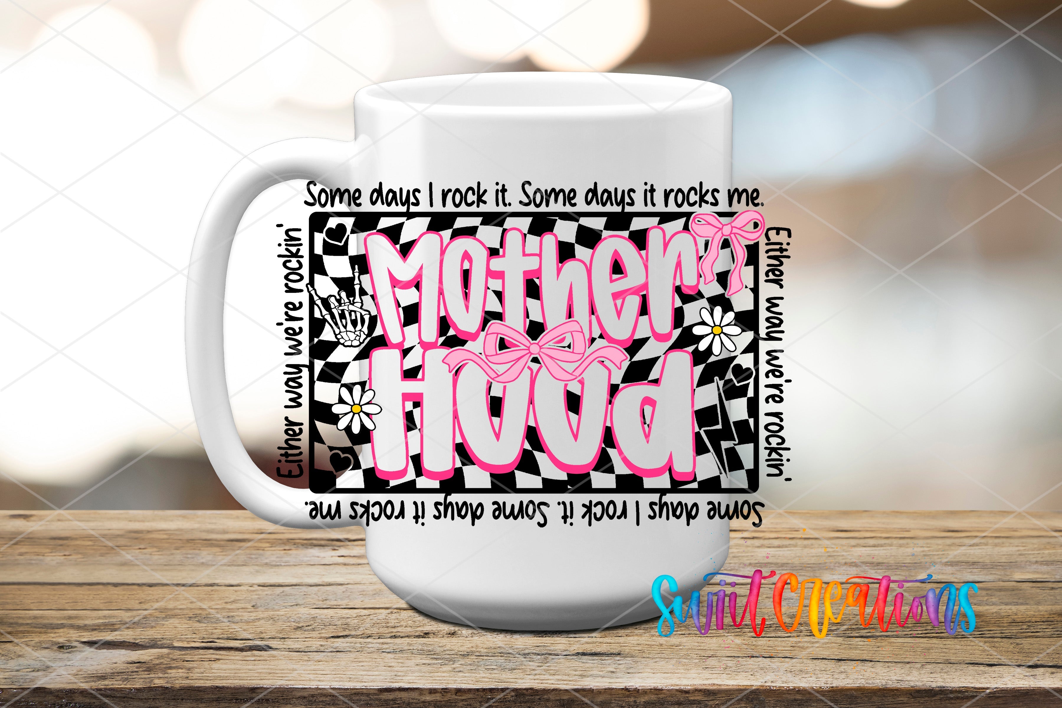 a white coffee mug with pink writing on it