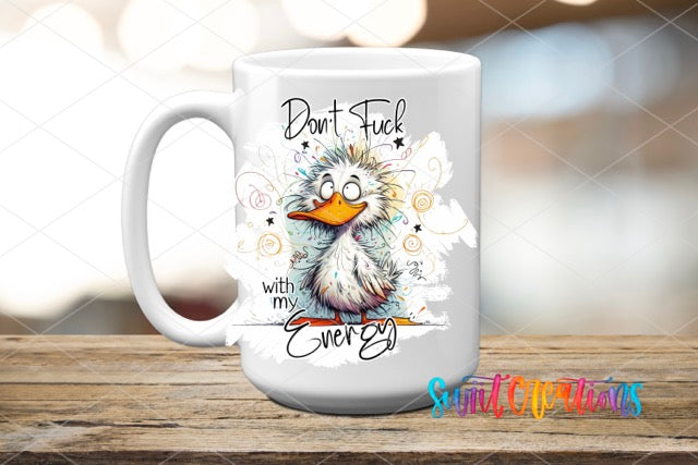 a white coffee mug with a bird on it