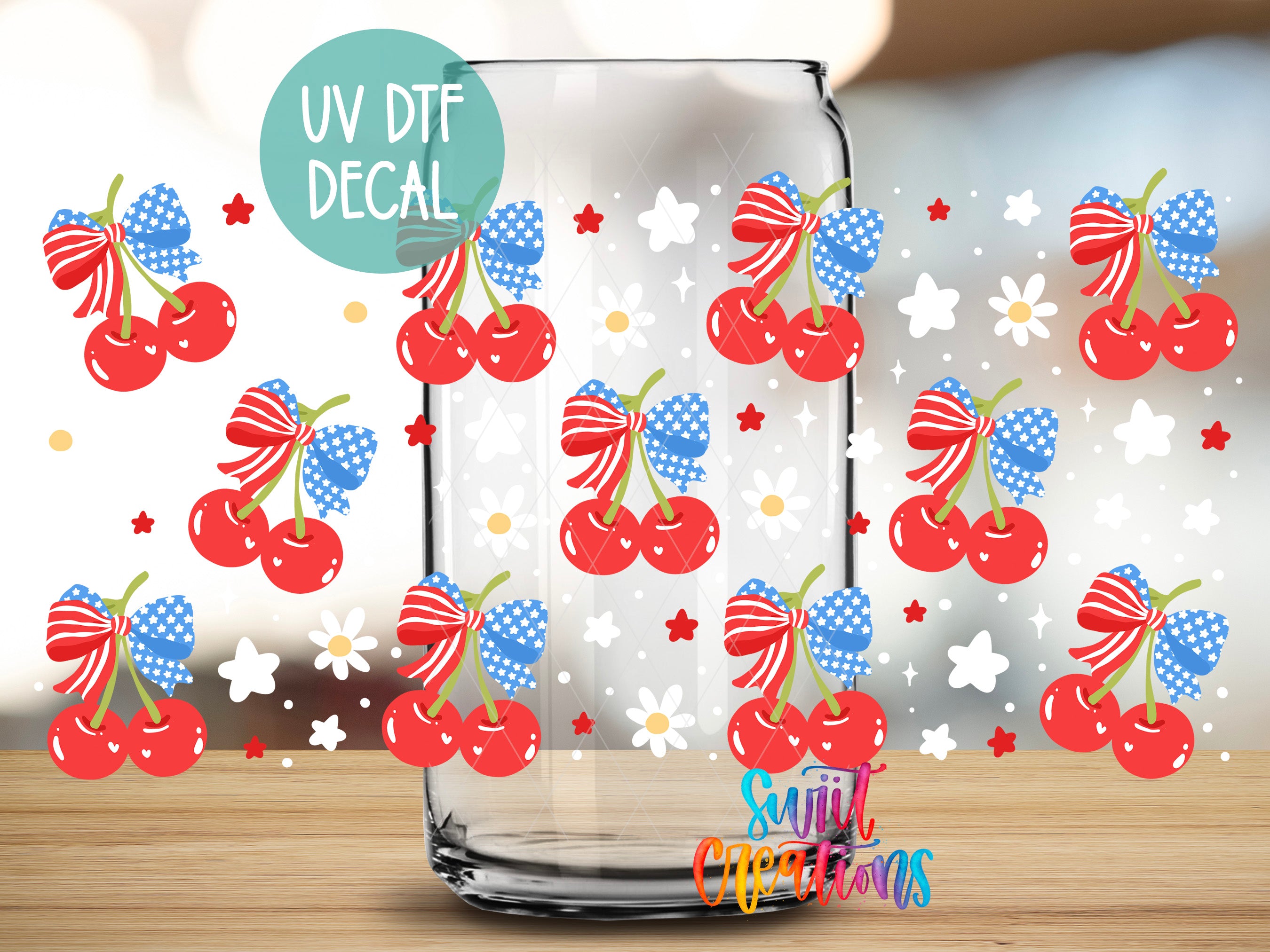 a glass vase with cherries and stars on it