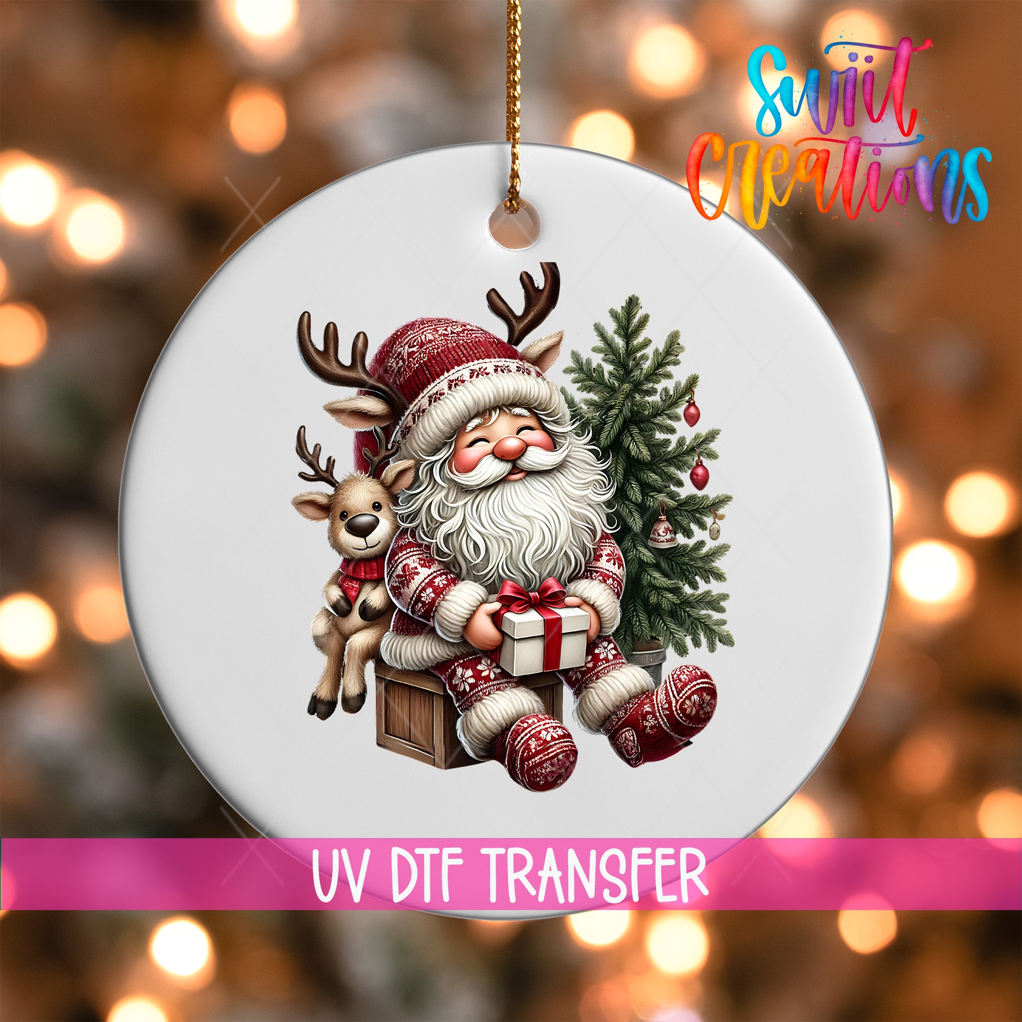 A white ornament featuring a smiling Santa Claus holding a reindeer and a Christmas tree, with the text "UV Dtf Transfer" and "Sweet Creations" in the background.