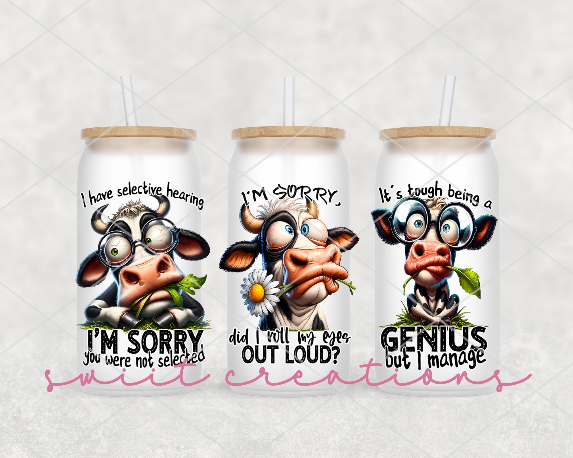 a set of three tumblers with cartoon cows on them